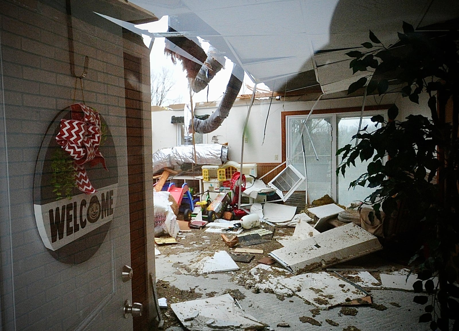 A home along Rangeline Road between Bradford and Covington in Miami County stands heavily damaged Friday morning March 15, 2024, after a likely tornado hit the area the night before. MARSHALL GORBY \STAFF