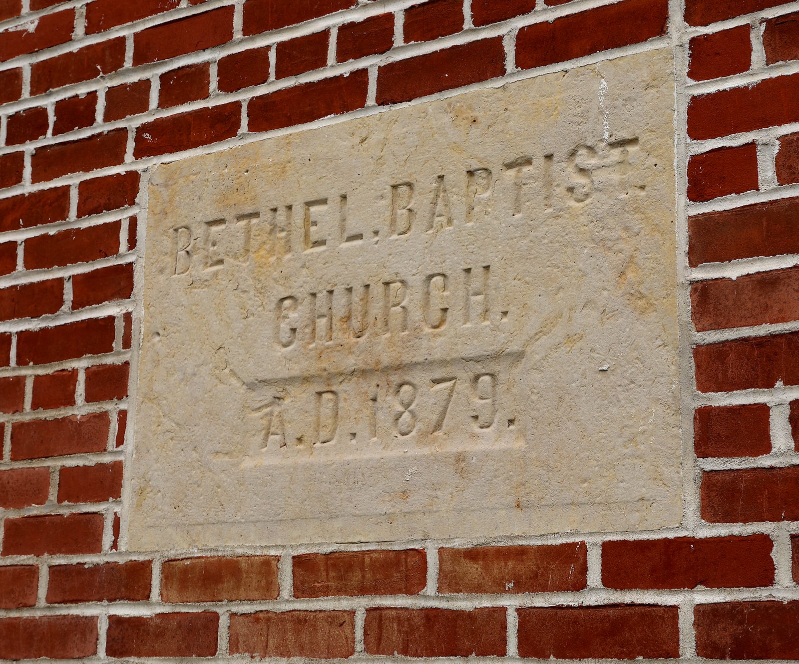 A marker from when one of the Bethel Baptist Church were built Wednesday, April 20, 2022. The church is celebrating it's 200th anniversary this Sunday, April 24. The church has been in the same location along New Carlisle Pike the entire 200 years. BILL LACKEY/STAFF