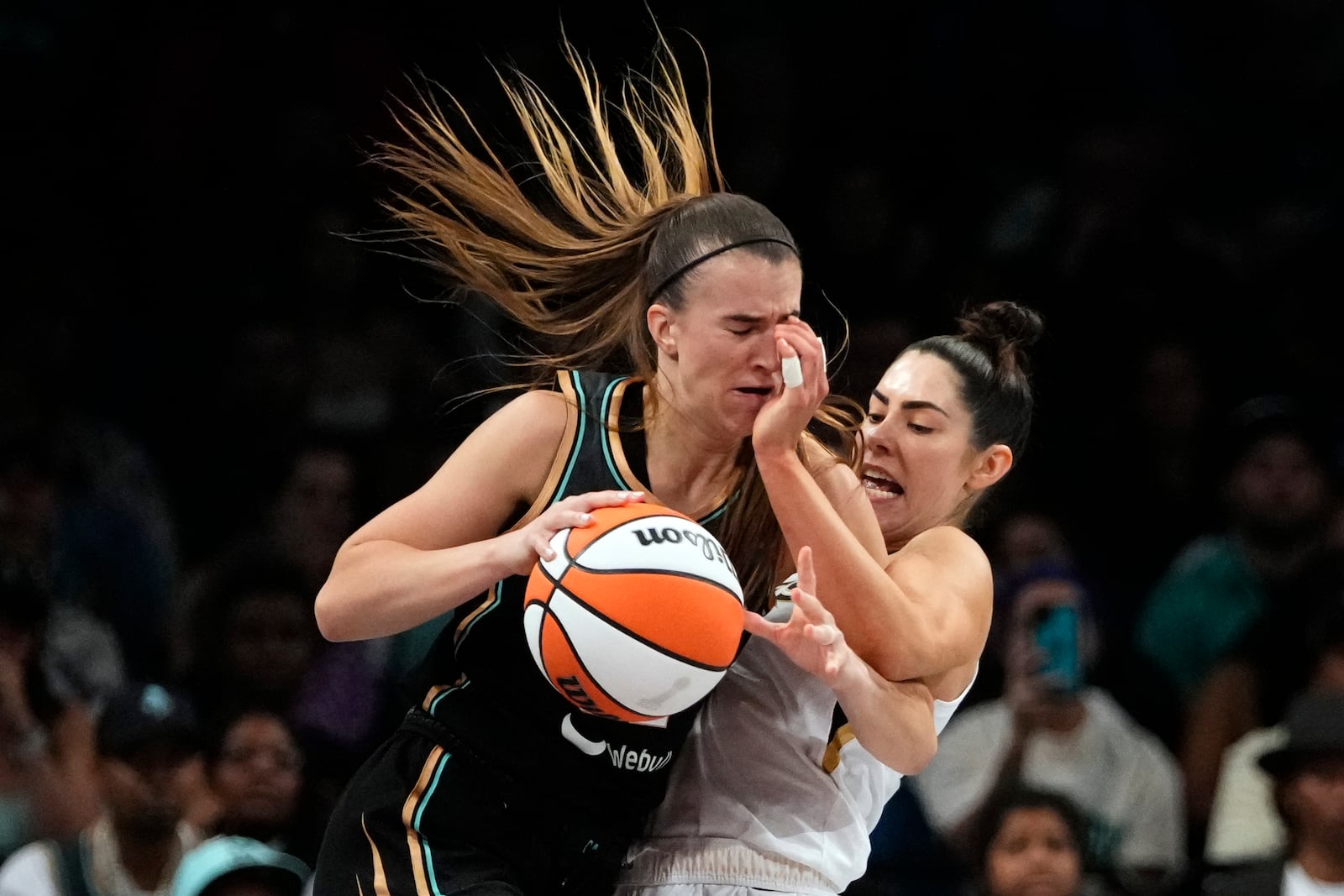 FILE - Las Vegas Aces' Kelsey Plum, right, defends New York Liberty's Sabrina Ionescu during the second half in Game 4 of a WNBA basketball final playoff series, Oct. 18, 2023, in New York. (AP Photo/Frank Franklin II, File)