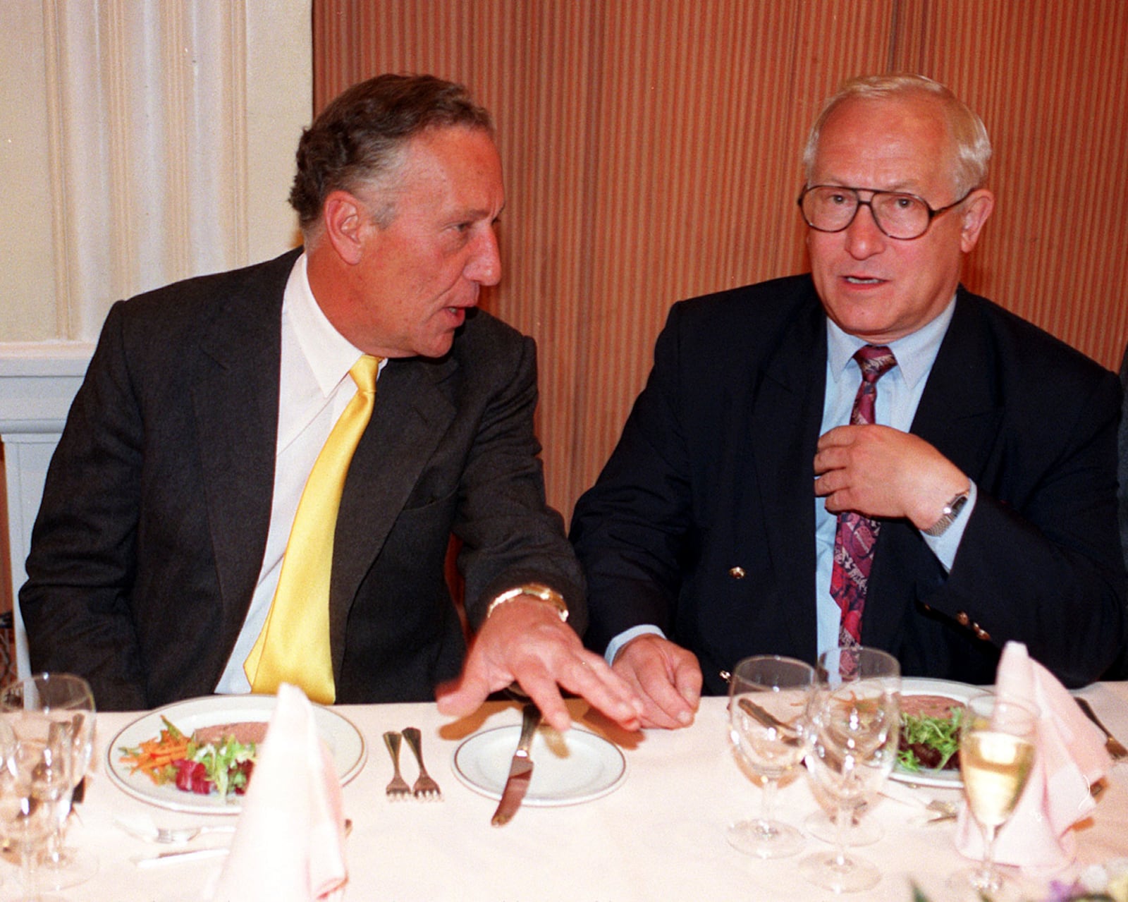 FILE - File photo dated 23/04/97 of author Frederick Forsyth, left. with Foyles luncheon chairman Oleg Gordievsky, at the Foyle's Literary,in London. Gordievsky died March 4 in England at the age of 86. (David Cheskin/PA via AP)