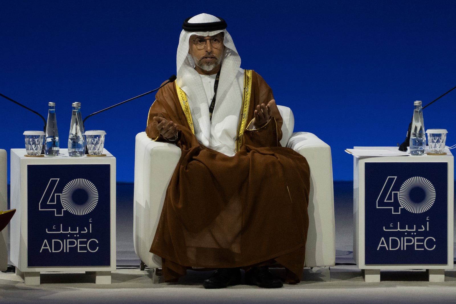 UAE Minister of Energy and Infrastructure Suhail al-Mazrouei talks in a panel during the inaugural session of the annual Abu Dhabi International Petroleum Exhibition and Conference (ADIPEC) in Abu Dhabi, United Arab Emirates, Monday, Nov. 4, 2024. (AP Photo/Altaf Qadri)