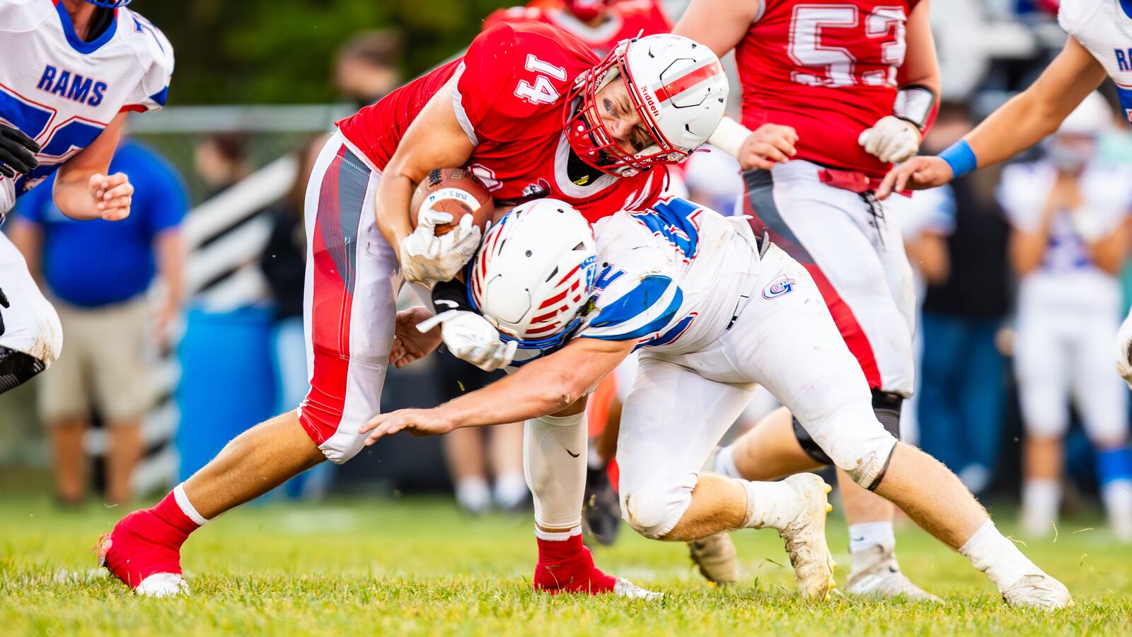 Southeastern High School junior Brennan Workman is hit by Greeneview junior Cooper Payton during their game against Southeastern on Friday night in South Charleston. The Rams won 20-13. CONTRIBUTED PHOTO BY MICHAEL COOPER