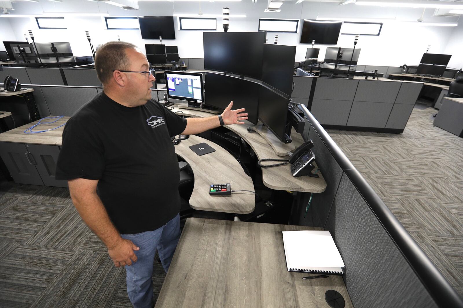 Major Chris Clark, of the Clark County Sheriff’s Department, talks about the new dispatch center, expected to open this year. Multiple American Rescue Plan Act (ARPA) allocations went toward dispatch center technology and fees, as well as fees for townships and villages in Clark County to use the center. BILL LACKEY/STAFF