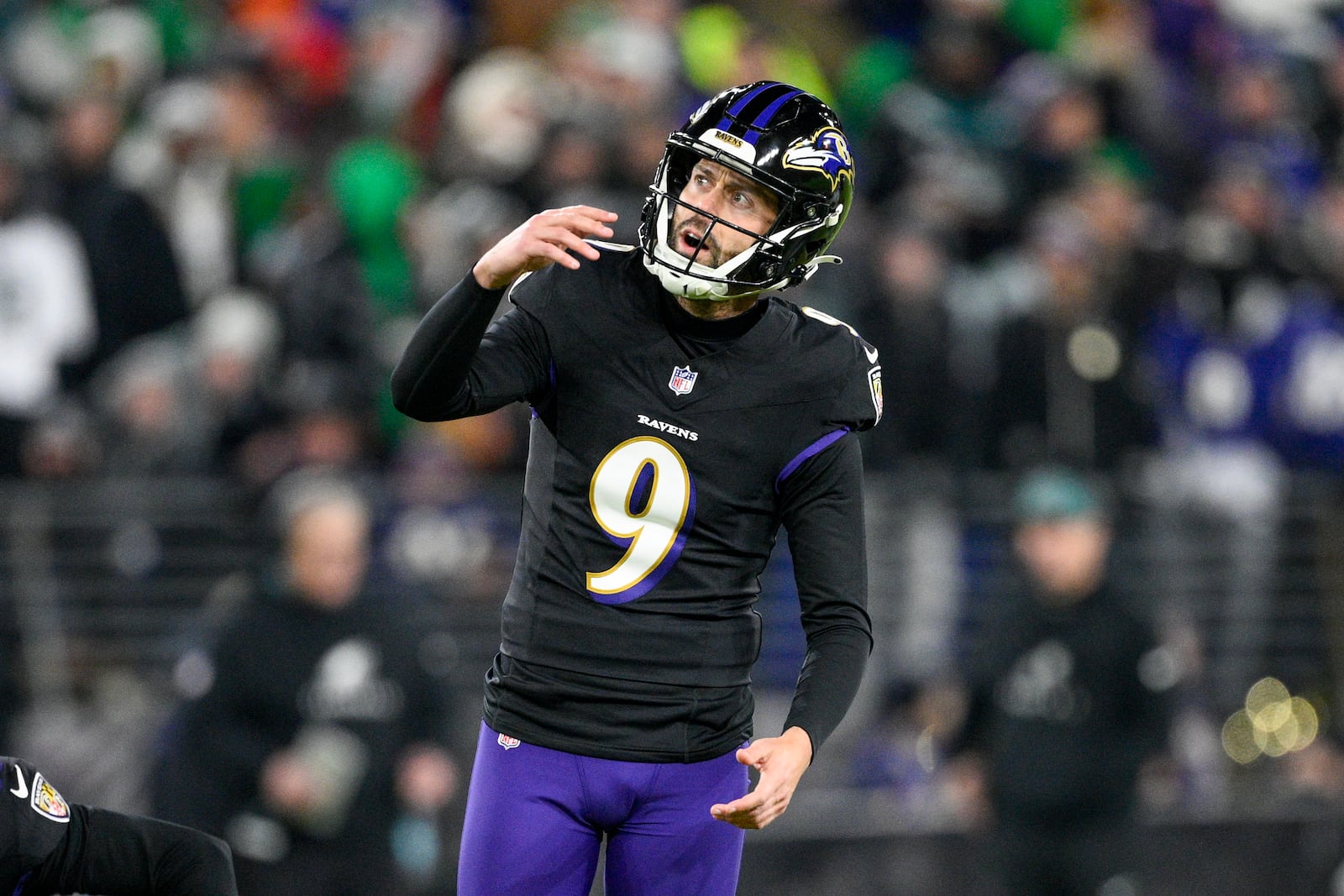 FILE - Baltimore Ravens kicker Justin Tucker watches his kick during the second half of an NFL football game against the Philadelphia Eagles, Dec. 1, 2024, in Baltimore. (AP Photo/Nick Wass, file)