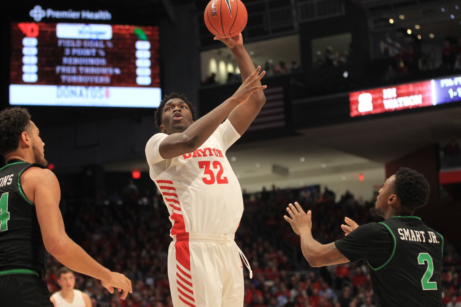 Dayton’s Jordy Tshimanga scores against North Texas on Tuesday, Dec. 17, 2019, at UD Arena.