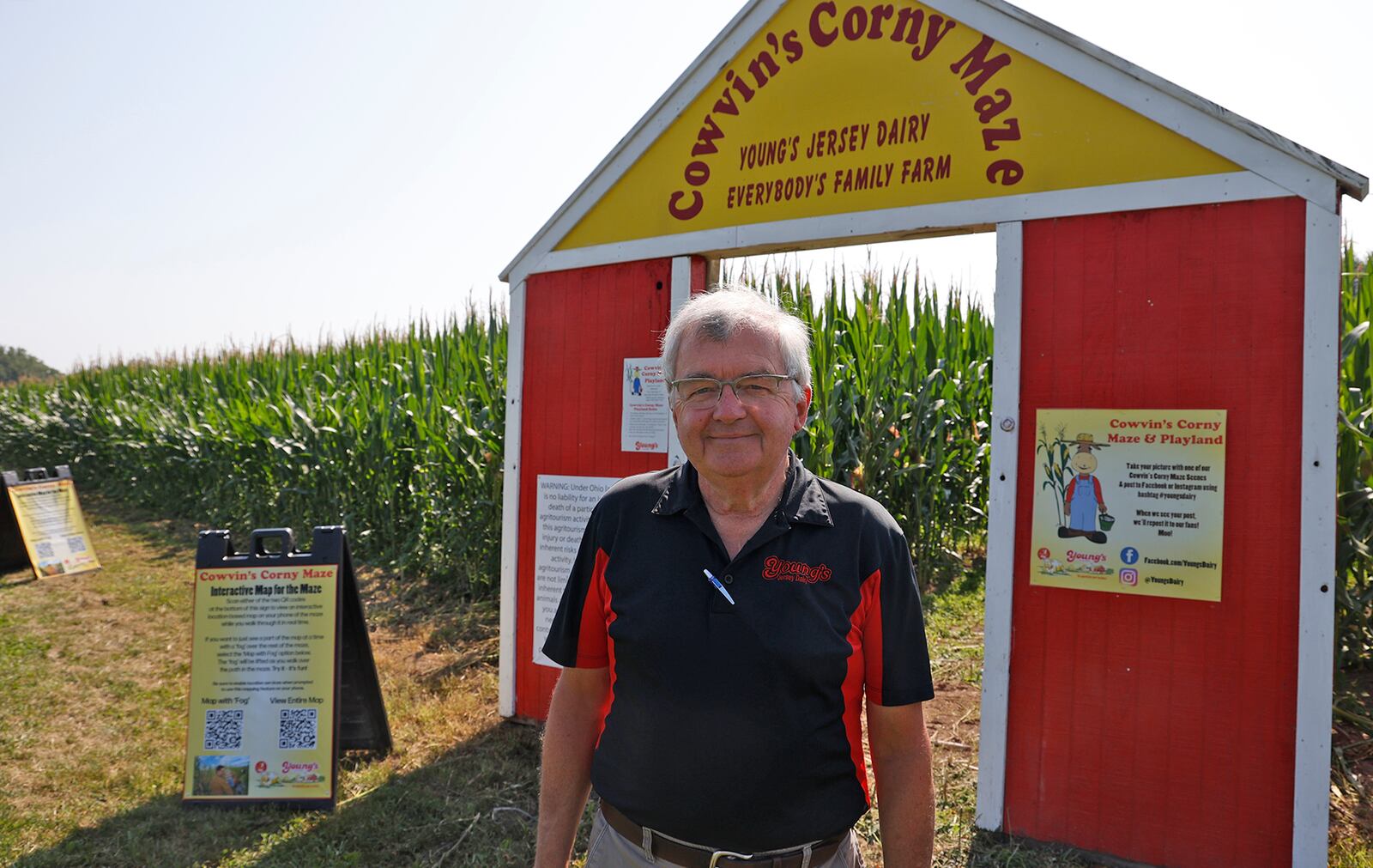 Dan Young stands at the entrance to Cowvin's Corny Maze Thursday, August 3, 2023. The maze at Young's Jersey Dairy opens Saturday for the first time this year. BILL LACKEY/STAFF