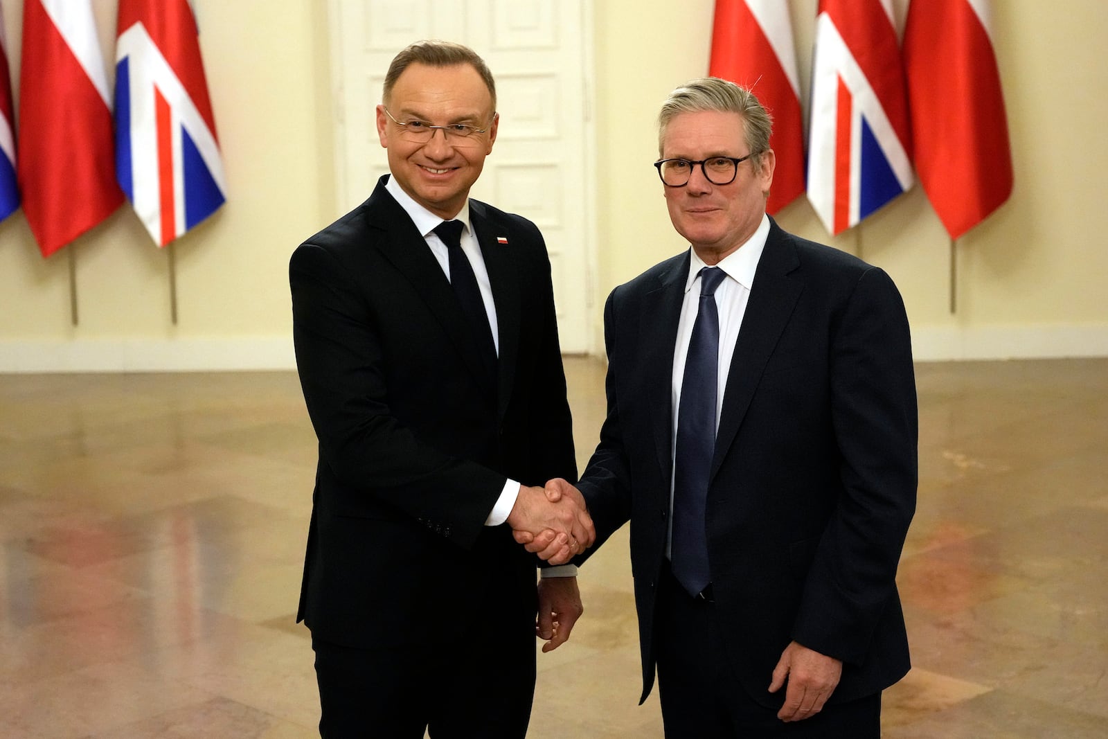 Britain's Prime Minister Keir Starmer and Polish President Andrzej Duda, left, meet in Warsaw, Friday, Jan. 17, 2025. (AP Photo/Czarek Sokolowski)