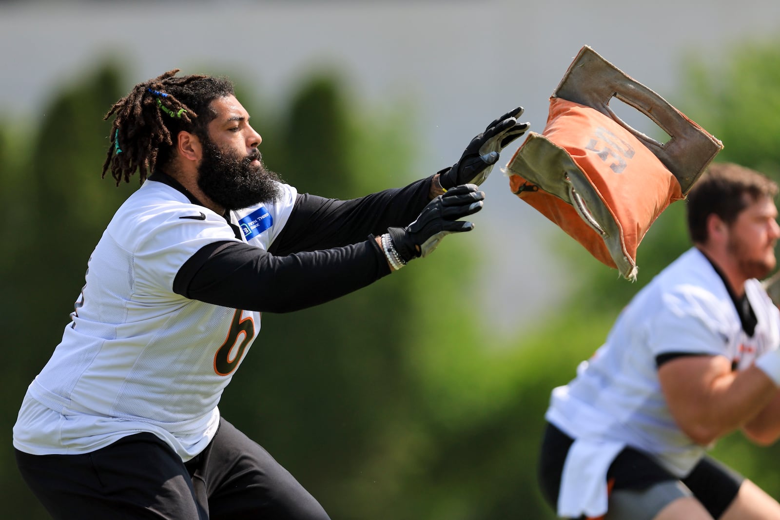 Cincinnati Bengals' Cody Ford takes part in a drill during NFL football practice in Cincinnati, Tuesday, May 23, 2023. (AP Photo/Aaron Doster)