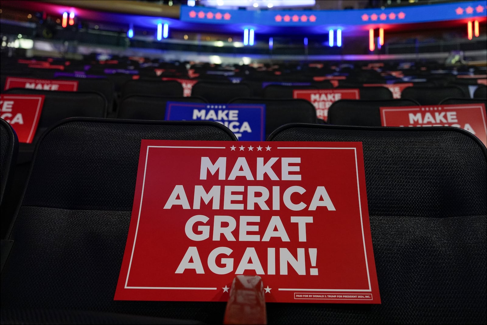 Signs are placed in seats before Republican presidential nominee former President Donald Trump speaks at a campaign rally at Madison Square Garden, Sunday, Oct. 27, 2024, in New York. (AP Photo/Julia Demaree Nikhinson)