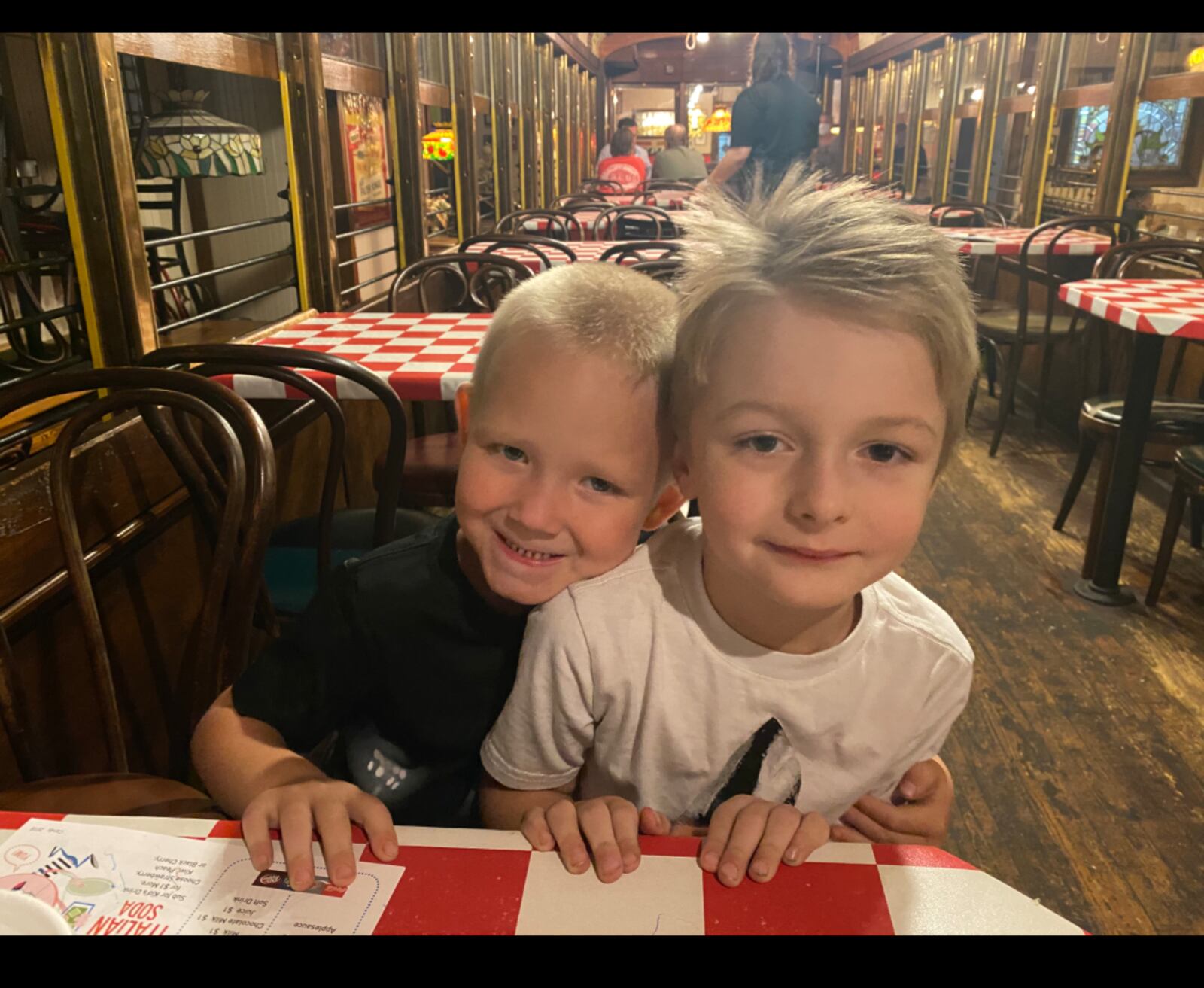 Nolan Combs, 8, smiled as his cousin Braxten hugged him. Photo provided by Kristina Roberson.