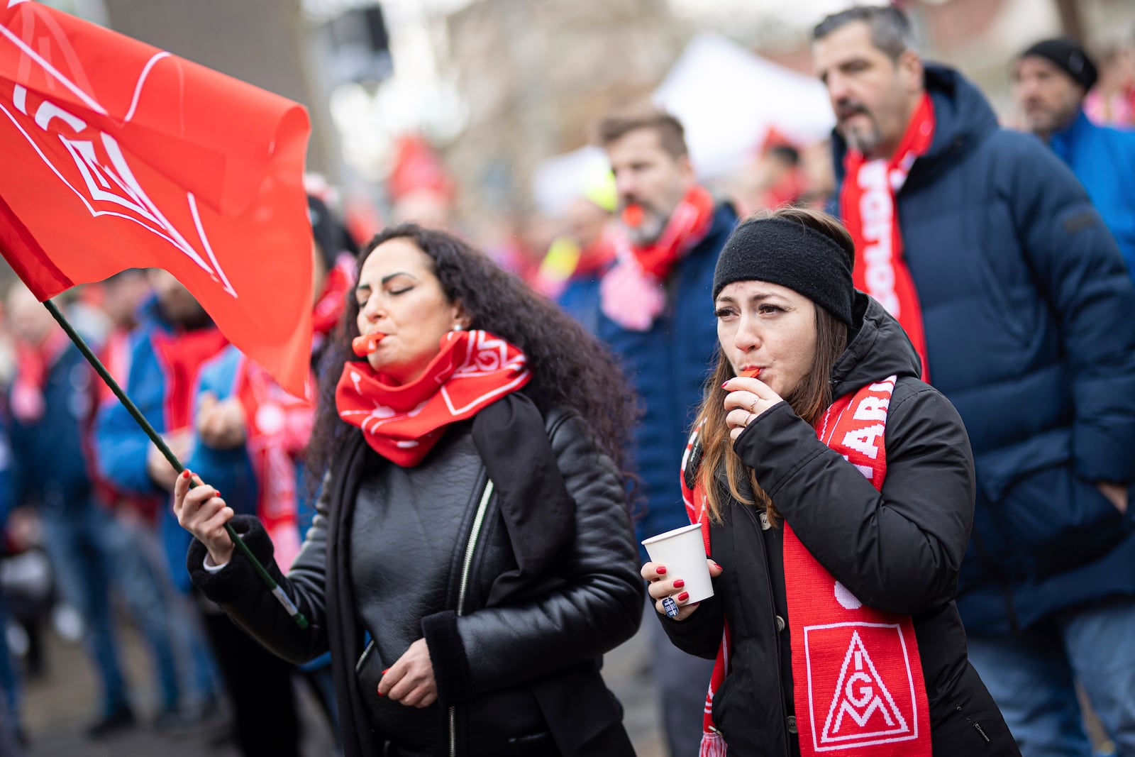 Volkswagen employees take part in a demonstration during at nationwide warning Volkswagen workers' strike, in Hanover, Germany, Monday, Dec. 2, 2024. (Moritz Frankenberg/dpa via AP)