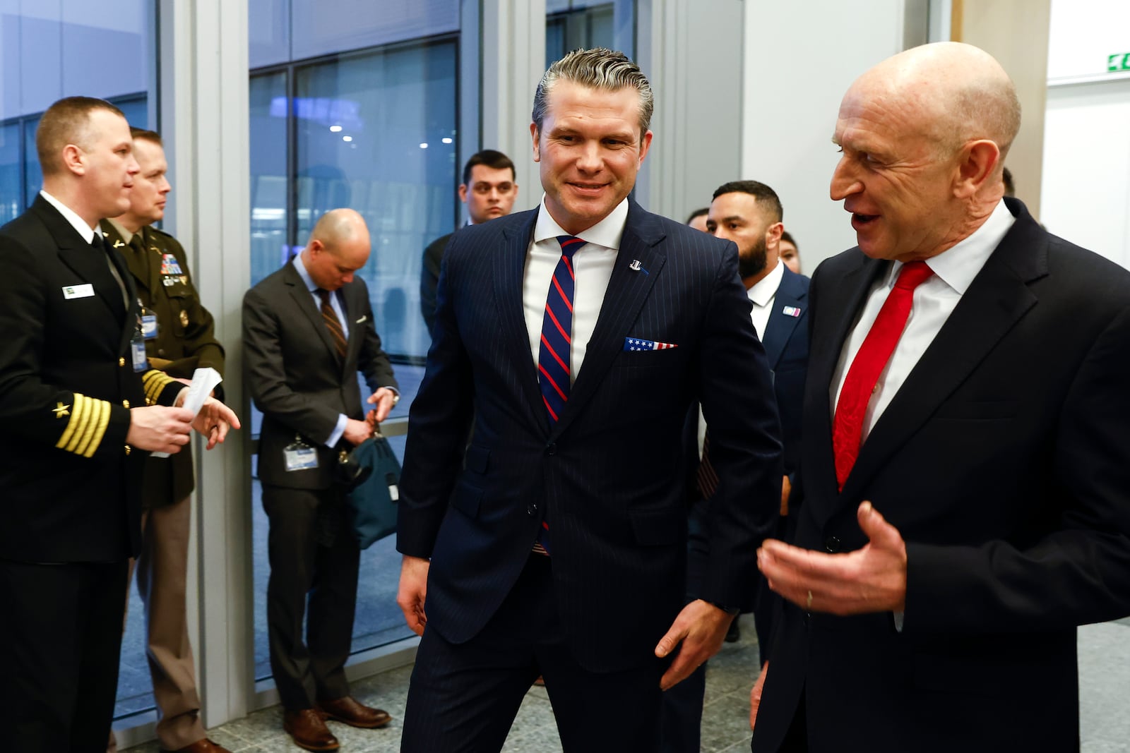 United States Secretary of Defense Pete Hegseth, center, walks with Britain's Defense Secretary John Healey prior to a bilateral meeting on the sidelines of a NATO defense ministers meeting at NATO headquarters in Brussels, Wednesday, Feb. 12, 2025. (Johanna Geron, Pool Photo via AP)