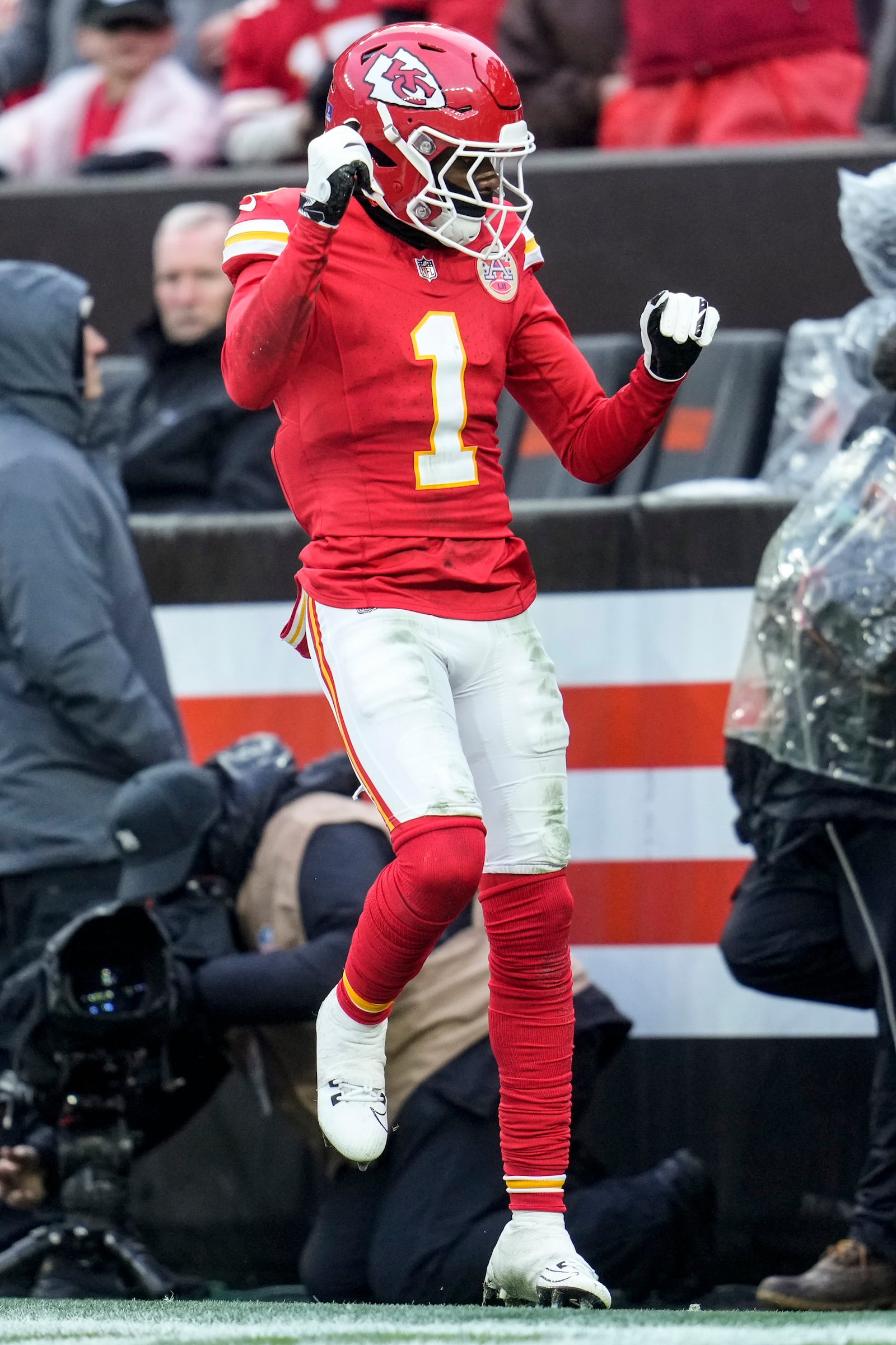 Kansas City Chiefs wide receiver Xavier Worthy (1) celebrates his touchdown against the Cleveland Browns during the second half of an NFL football game, Sunday, Dec. 15, 2024, in Cleveland. (AP Photo/Sue Ogrocki)