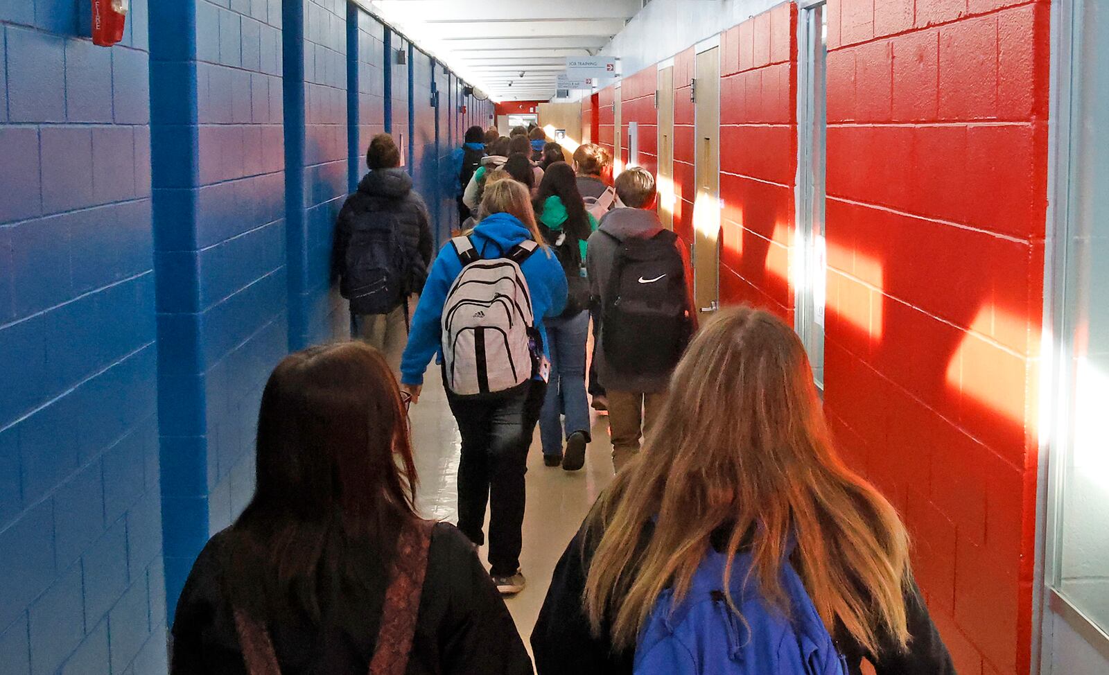 Students walk down a narrow hallway during a class change Tuesday, Feb. 14, 2024 at the Springfield/Clark CTC. BILL LACKEY/STAFF