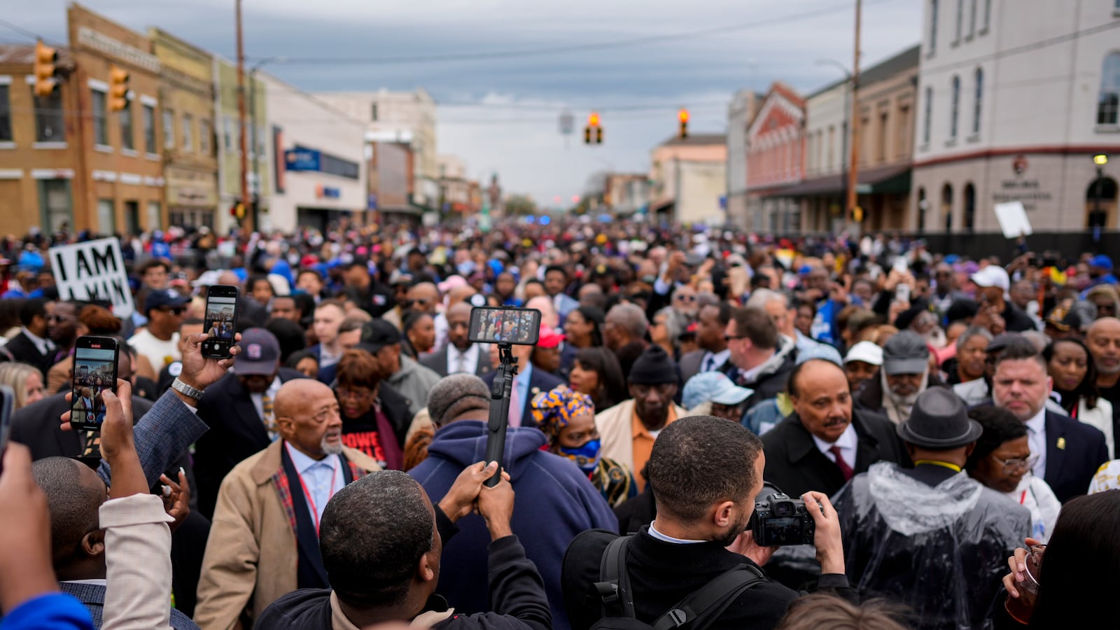 People march to the Edmund Pettus bridge during the 60th anniversary of the march to ensure that African Americans could exercise their constitutional right to vote, Sunday, March 9, 2025, in Selma, Ala. (AP Photo/Mike Stewart)