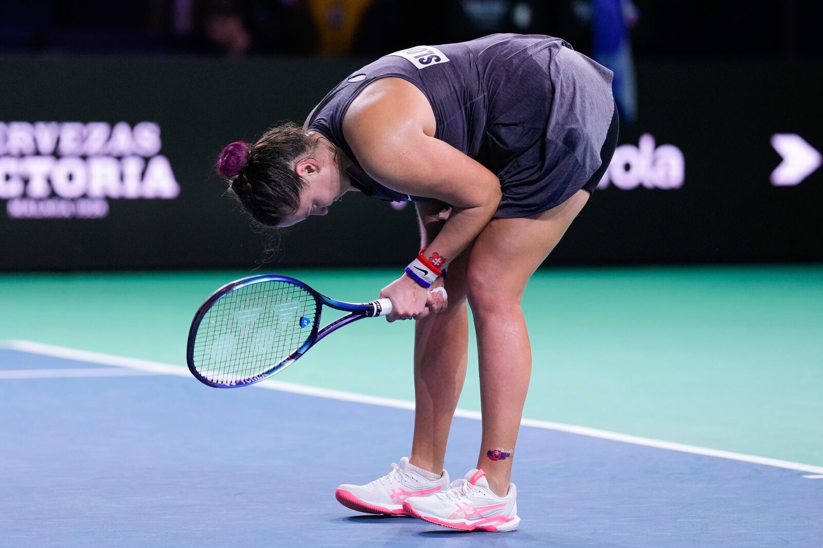 Slovakia's tennis player Viktoria Hruncakova, reacts during the Billie Jean King Cup final against Italy's Lucia Bronzetti at the Martin Carpena Sports Hall in Malaga, southern Spain, on Wednesday, Nov. 20, 2024. (AP Photo/Manu Fernandez)