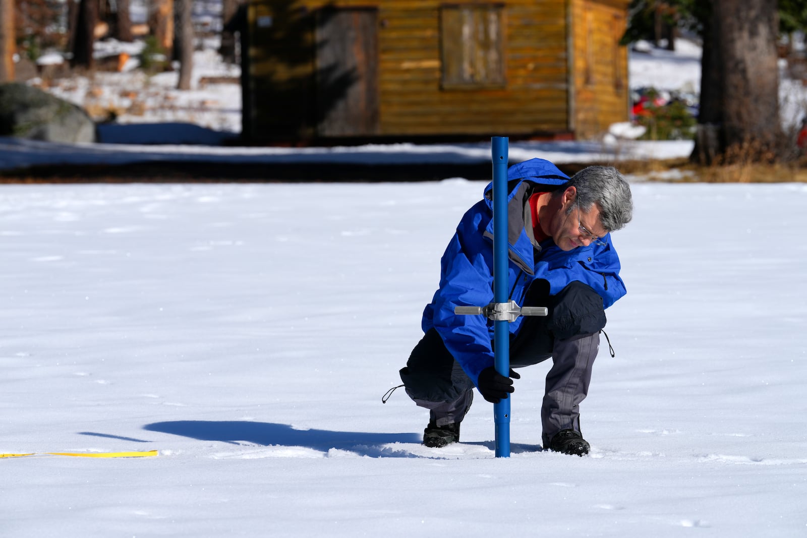 From the California Department of Water Resources, Andy Reising the Manager of the Snow Survey and Water Supply Forecasting Unit conducts the first snow survey of the season to assess how much water the state might have come spring and summer at Phillips Station on Thursday, Jan. 2, 2025. (AP Photo/Brooke Hess-Homeier)