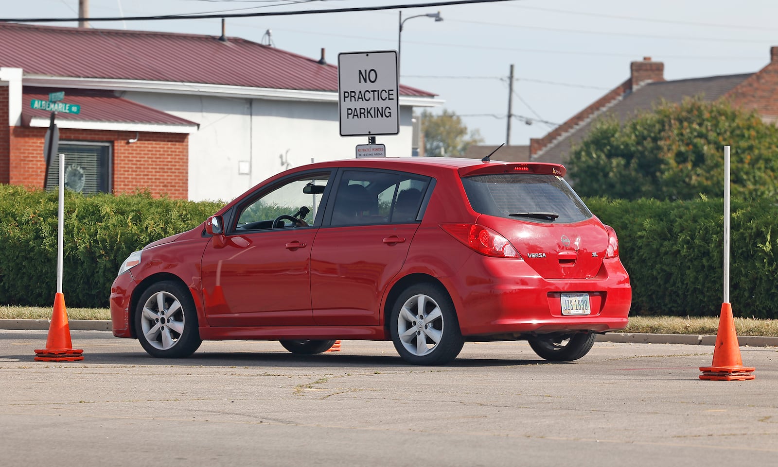 A driver goes through the maneuverability test in the parking lot of the Park Shopping Center Thursday, Sept. 21, 2023. BILL LACKEY/STAFF