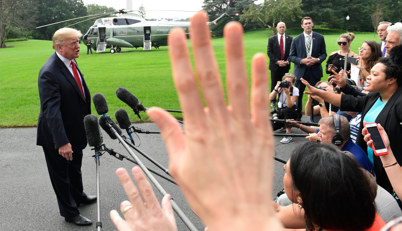 FILE - President Donald Trump speaks to reporters on the South Lawn of the White House in Washington, Oct. 8, 2018. (AP Photo/Susan Walsh, File)