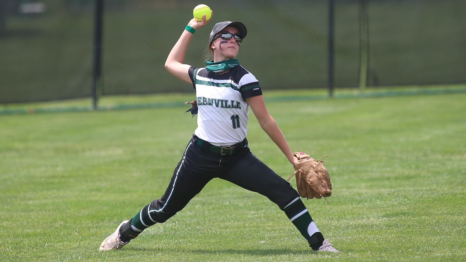 Greenville High School's Bri Fellers throws the ball in from left field during their game against Shawnee on Thursday afternoon at Mason High School. The Green Wave beat the Braves 2-0. CONTRIBUTED PHOTO BY MICHAEL COOPER