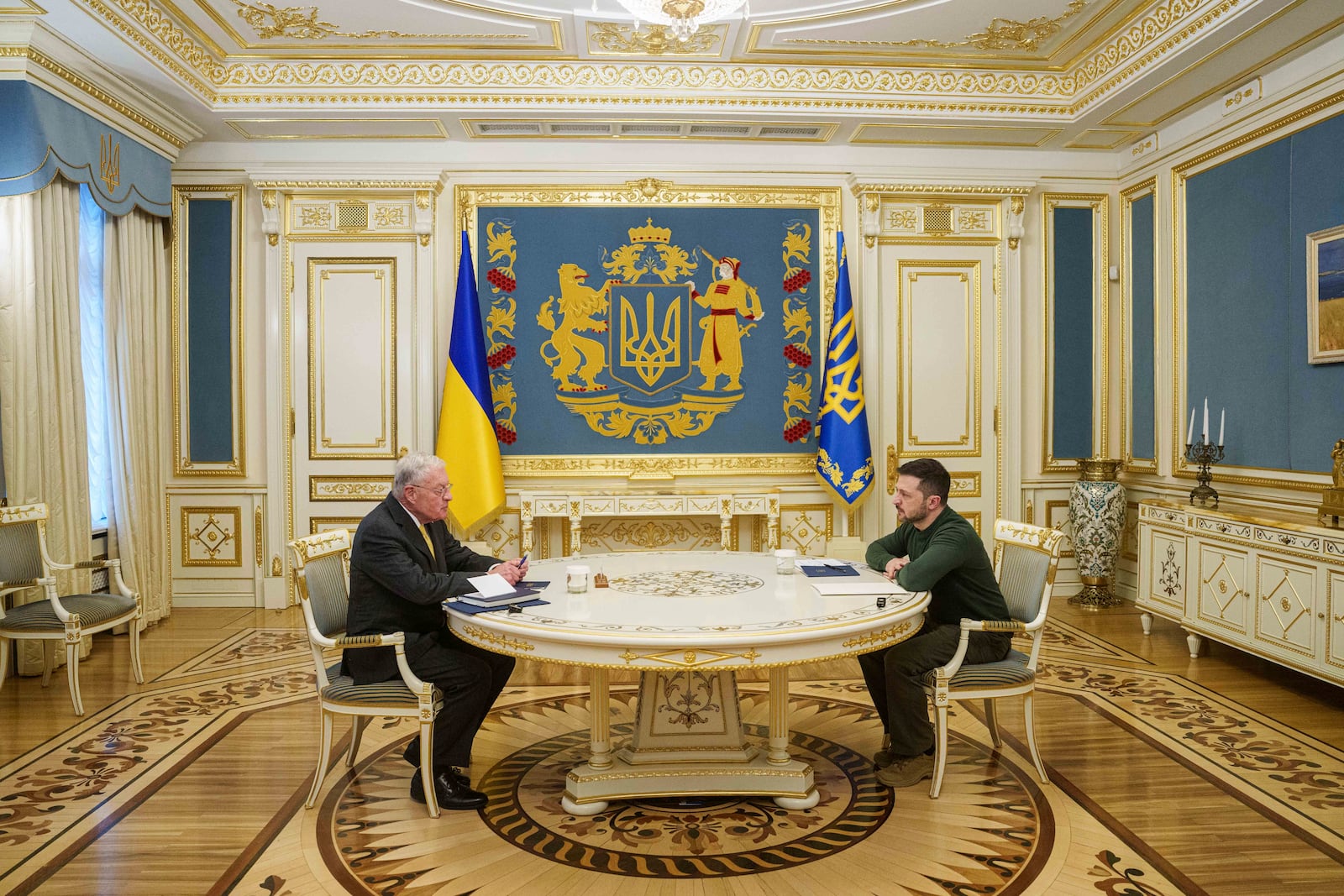 U.S. Special Envoy for Ukraine and Russia Keith Kellogg, left, and Ukraine's President Volodymyr Zelenskyy talk during their meeting in Kyiv, Ukraine, Feb. 20, 2025. (AP Photo/Evgeniy Maloletka)