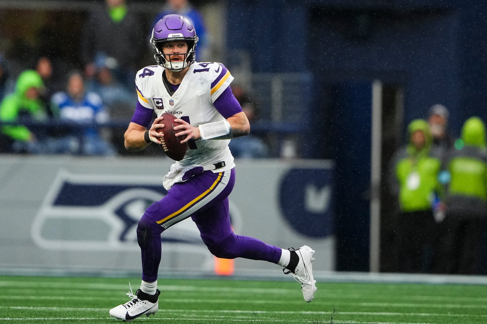 FILE - Minnesota Vikings quarterback Sam Darnold looks to pass during an NFL football game against the Seattle Seahawks, Sunday, Dec. 22, 2024, in Seattle. (AP Photo/Lindsey Wasson, File)