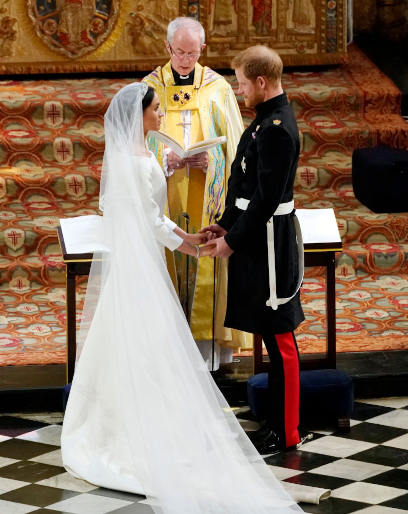 Prince Harry and Meghan Markle exchange vows during their wedding ceremony in St George's Chapel at Windsor Castle on May 19, 2018 in Windsor, England.