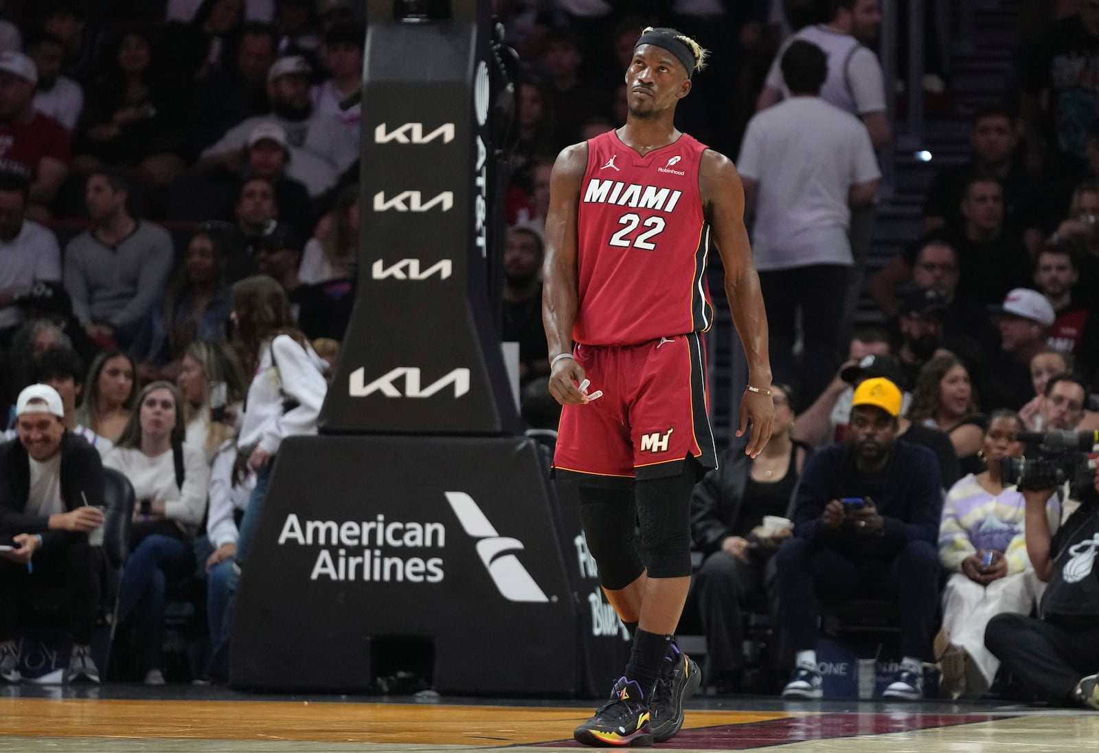 Miami Heat forward Jimmy Butler (22) stands on the court during the second half of an NBA basketball game against the Portland Trail Blazers, Tuesday, Jan. 21, 2025, in Miami. (AP Photo/Lynne Sladky)