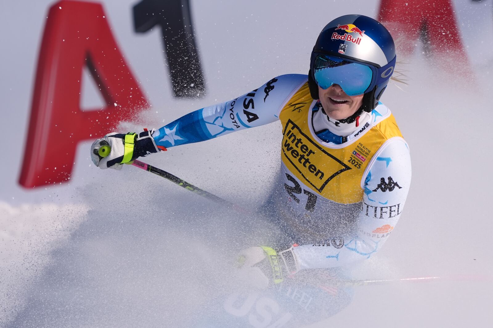 United States' Lindsey Vonn arrives at the finish area of a women's downhill race, at the Alpine Ski World Championships, in Saalbach-Hinterglemm, Austria, Saturday, Feb. 8, 2025. (AP Photo/Giovanni Auletta)