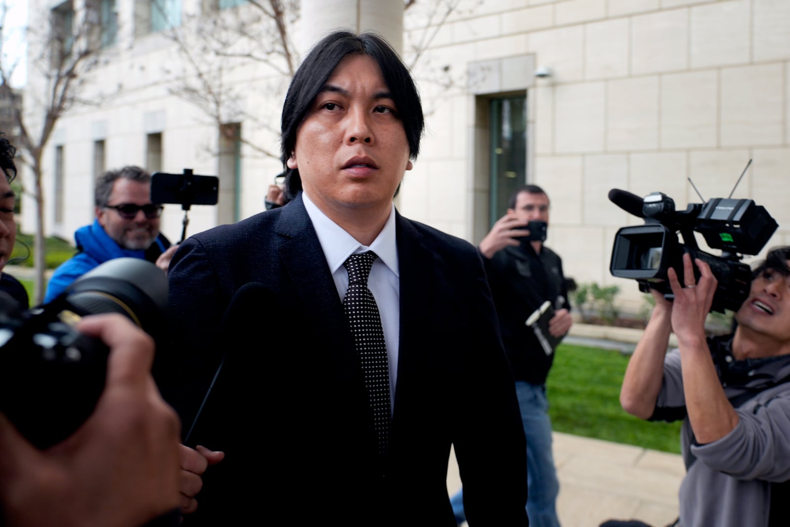 Ippei Mizuhara, former interpreter for Los Angeles Dodgers baseball star Shohei Ohtani expected to be sentenced for bank and tax fraud arrives at federal court on Thursday, Feb. 6, 2025, in Santa Ana, Calif. (AP Photo/Damian Dovarganes)