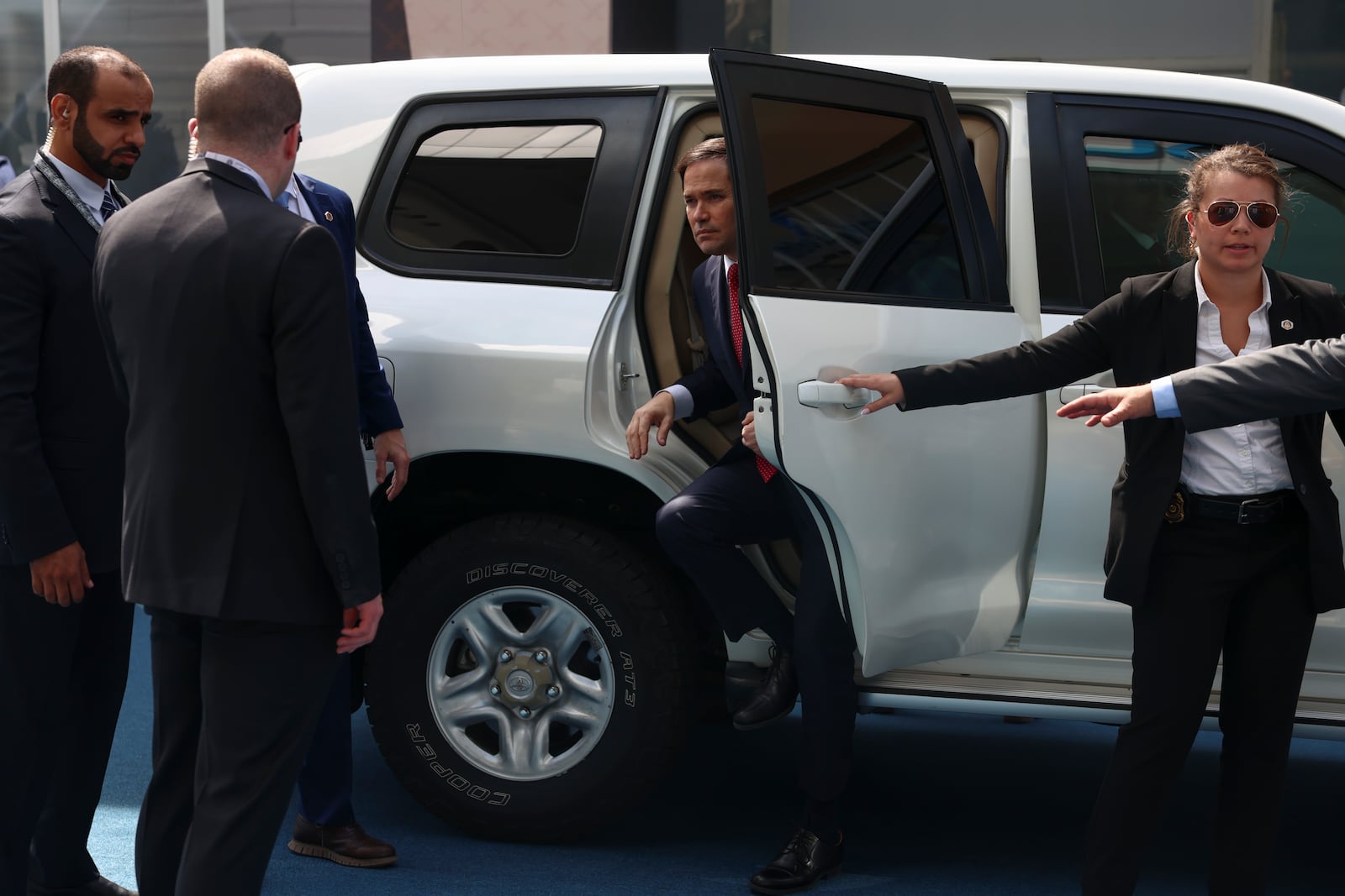 U.S. Secretary of State Marco Rubio gets out of a vehicle at ADNEC Centre Abu Dhabi in Abu Dhabi, United Arab Emirates, Wednesday, Feb. 19, 2025. (Evelyn Hockstein/Pool Photo via AP)