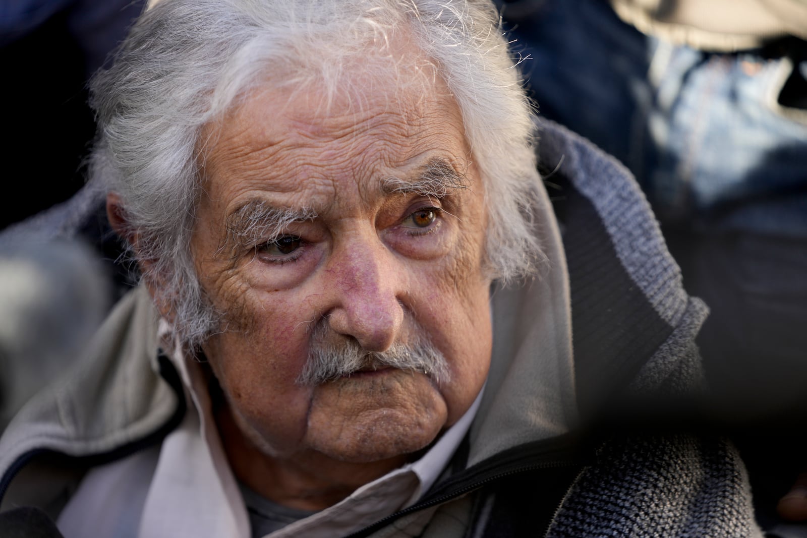 Former Uruguayan President Jose "Pepe" Mujica talks to journalists after voting at a polling station during general elections in Montevideo, Uruguay, Sunday, Oct. 27, 2024. (AP Photo/Natacha Pisarenko)