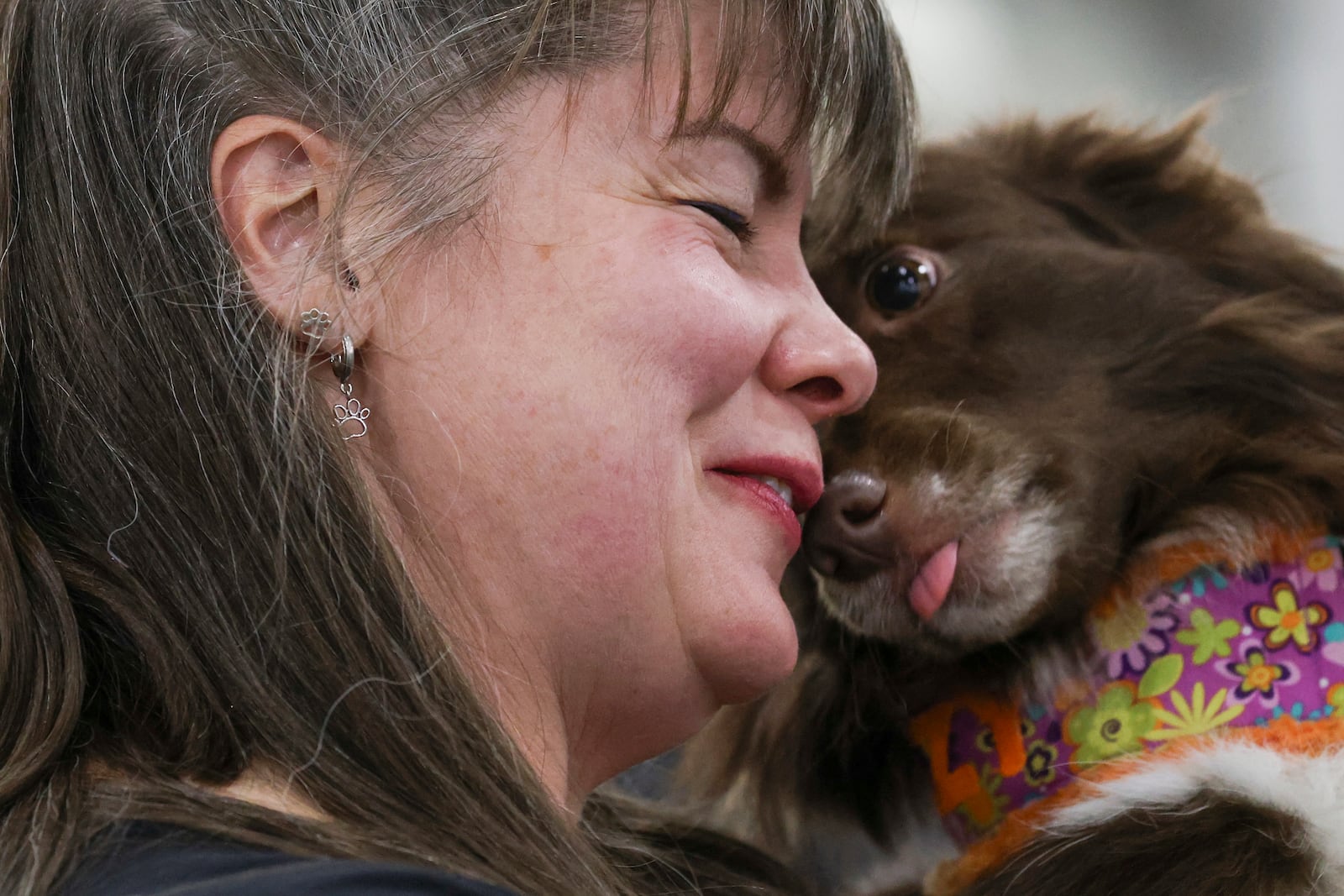 Alicia Bismore with her dog Dazy, waits for the flyball tournament at the 149th Westminster Kennel Club Dog show, Saturday, Feb. 8, 2025, in New York. (AP Photo/Heather Khalifa)