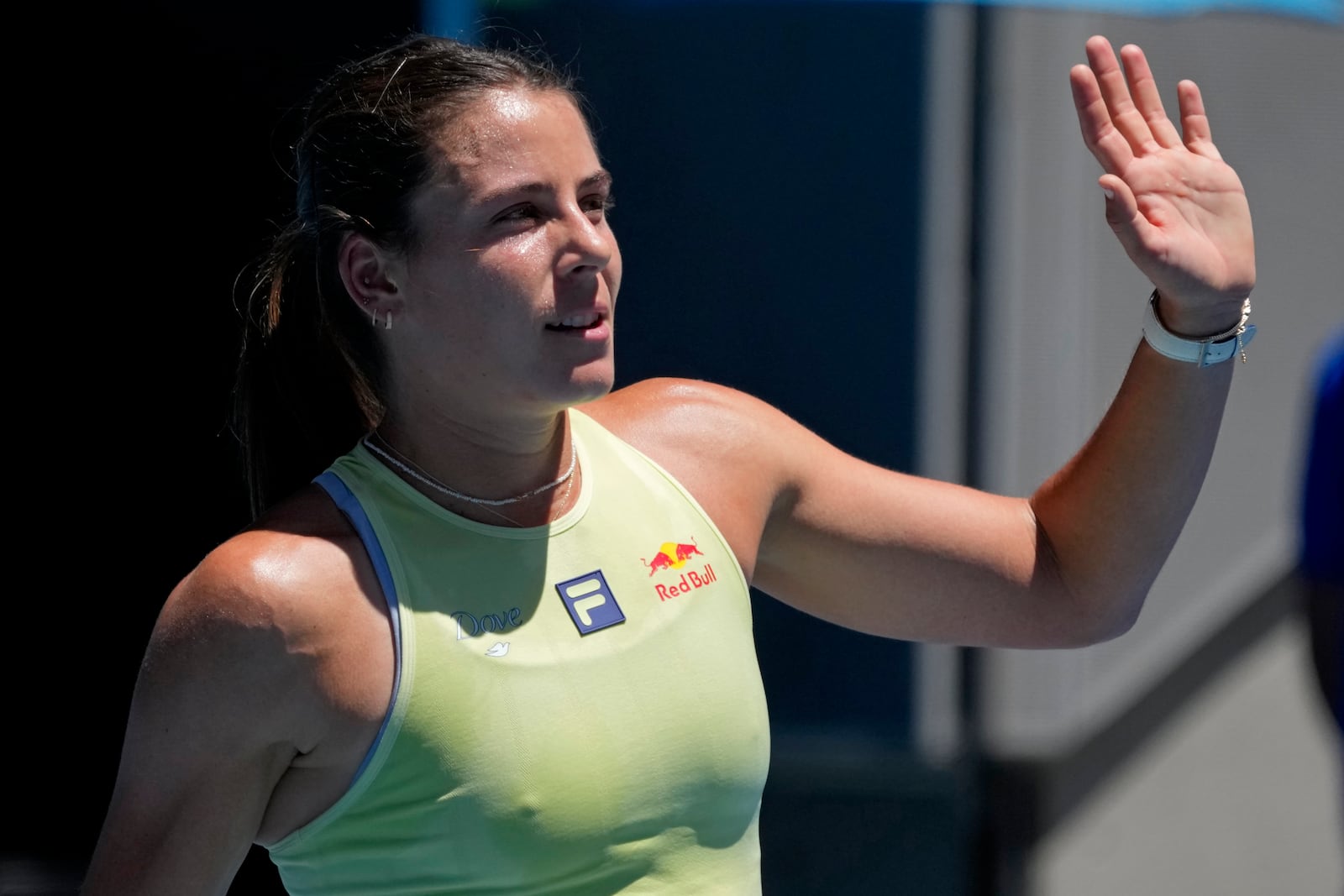 Emma Navarro of the U.S. waves after defeating Ons Jabeur of Tunisia in their third round match at the Australian Open tennis championship in Melbourne, Australia, Saturday, Jan. 18, 2025. (AP Photo/Manish Swarup)