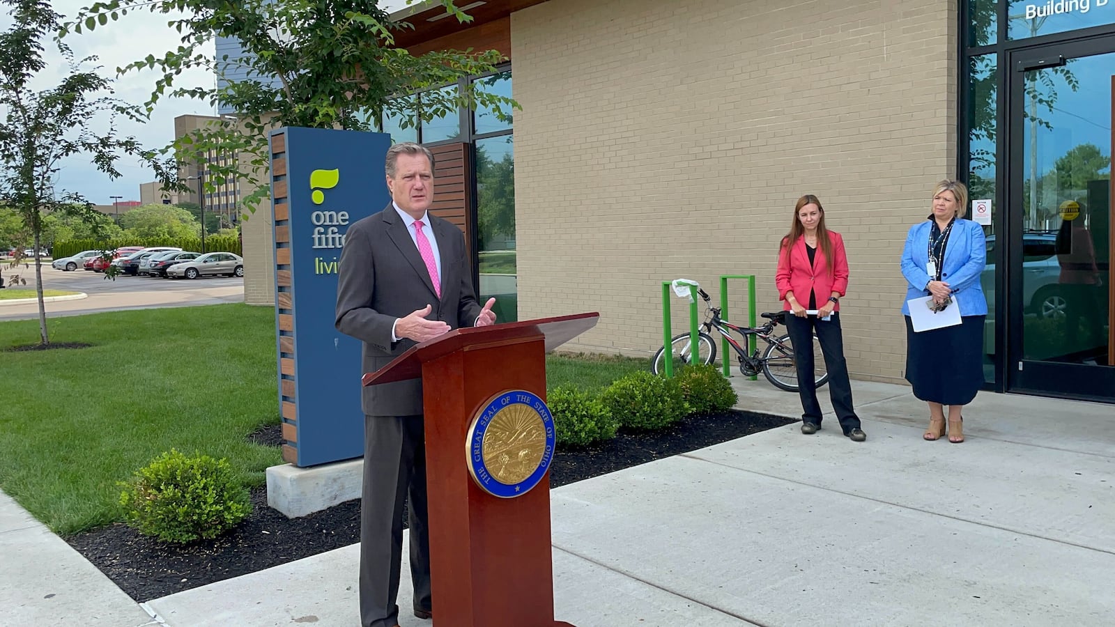 Congressman Mike Turner, R-Dayton, speaks in front of OneFifteen Tuesday, July 5, 2022, about the passage of the Mainstreaming Addiction Treatment Act. Dr. Natalie Lester and OneFifteen President and CEO Marti Taylor also spoke about the law's passage. / PARKER PERRY