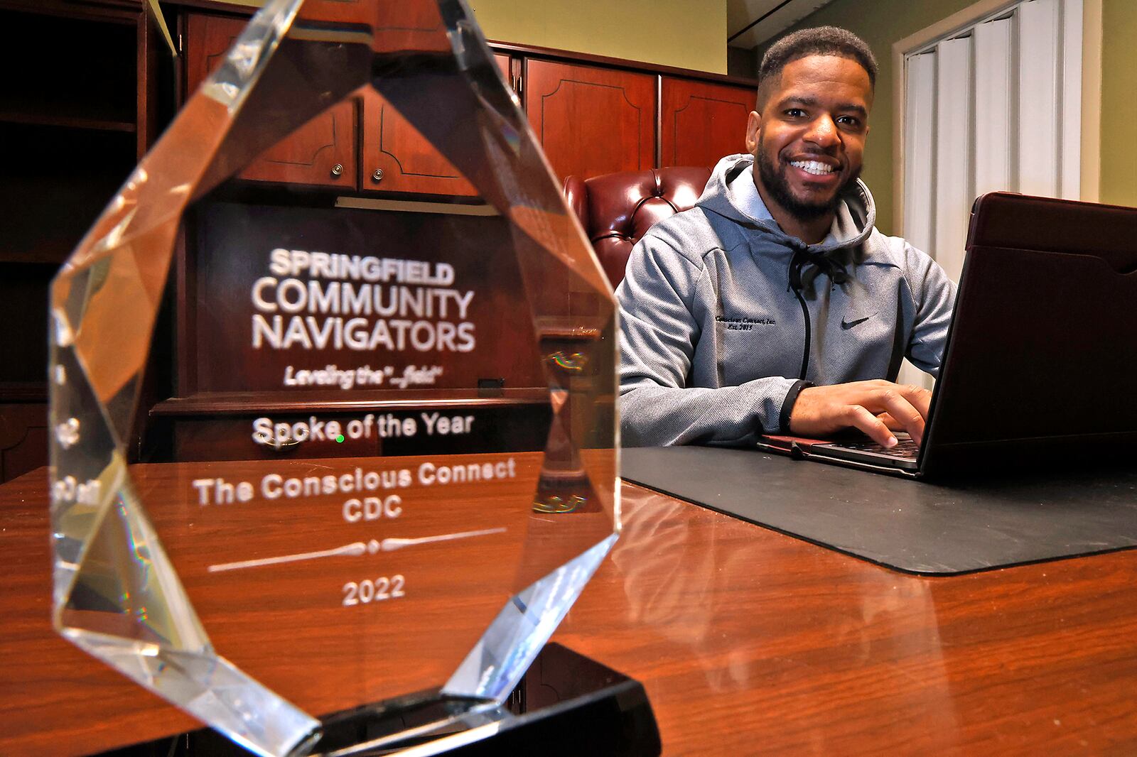 Karlos Marshall, a co-founder of Conscious Connect, in the organization's new office on Yellow Springs Street. BILL LACKEY/STAFF