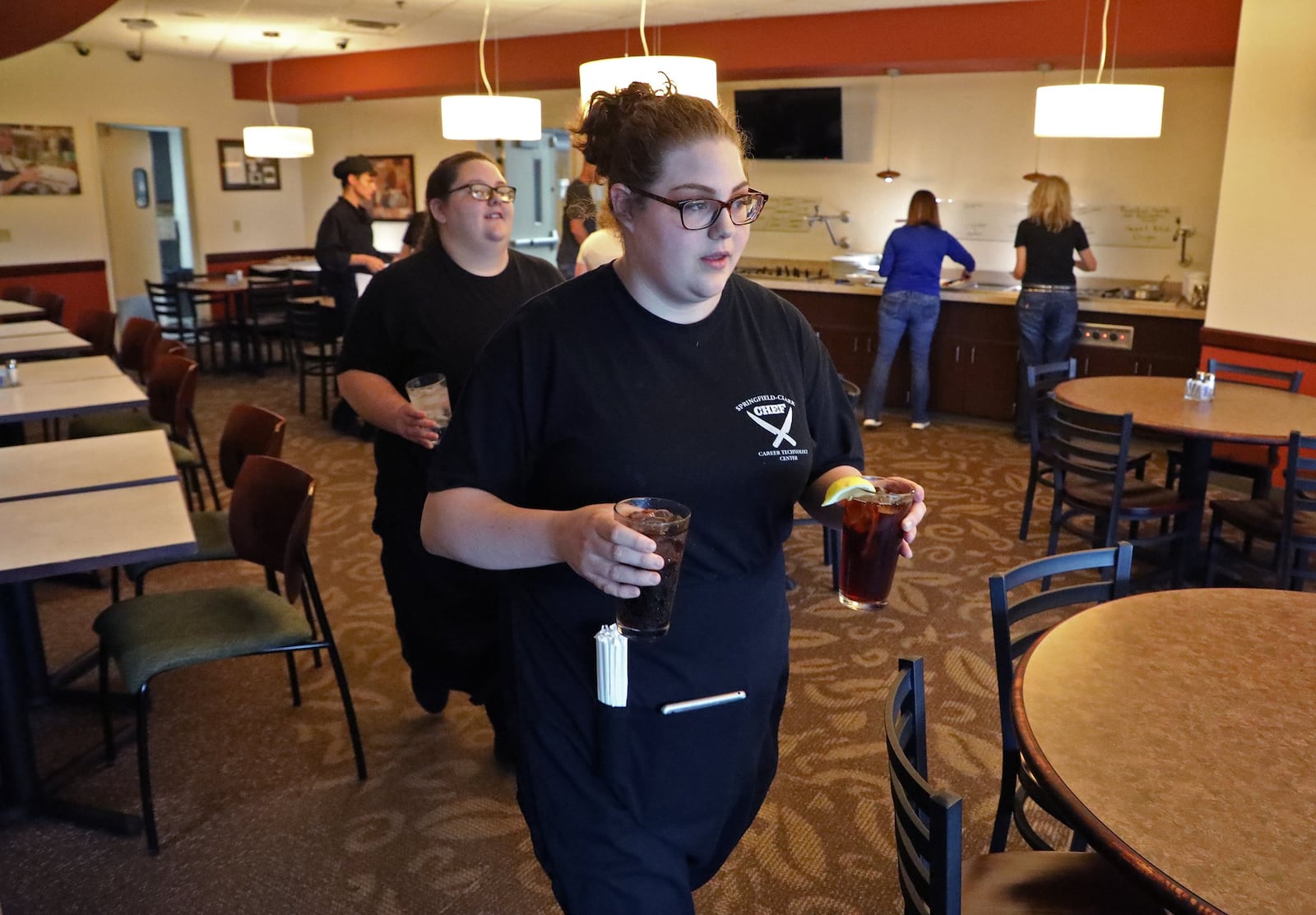 The service is perfect at the Jaguar Room as students like Caitlyn Doepel take care of you. BILL LACKEY/STAFF