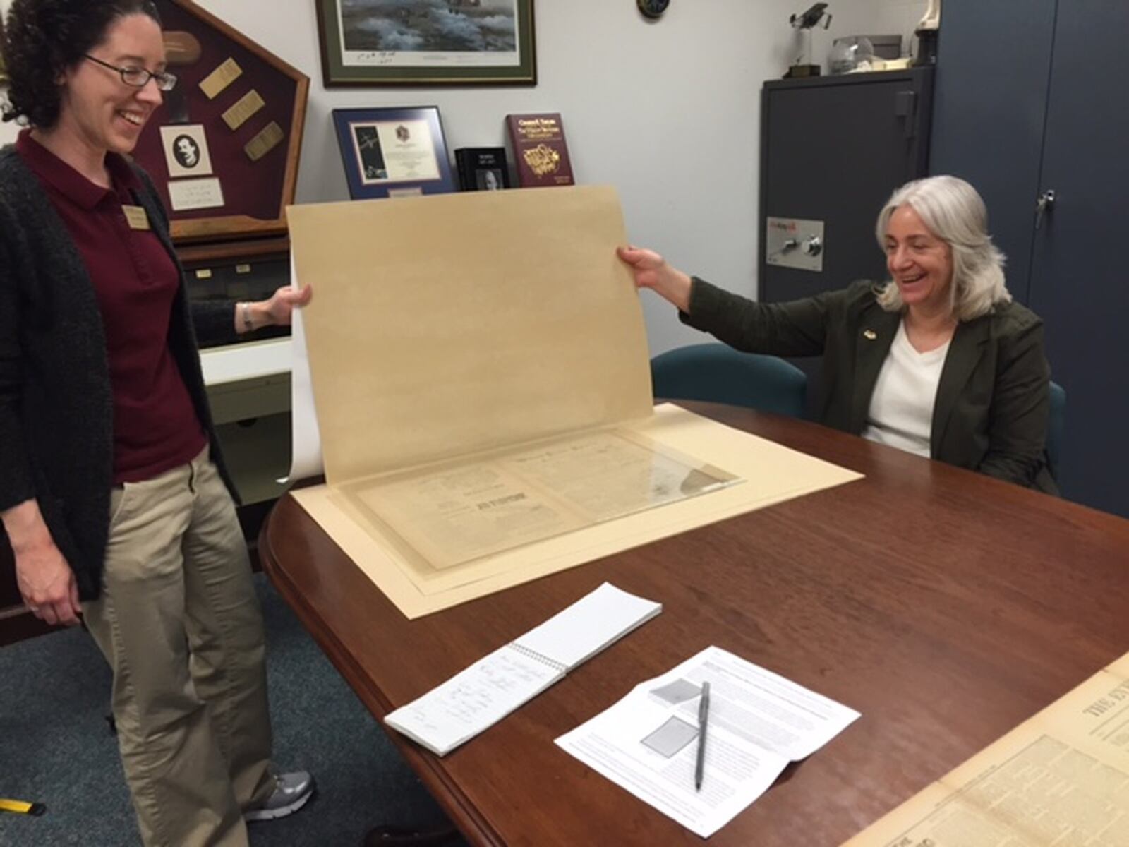 Lisa Rickey, Wright State University  archivist for digital initiatives (left), and Dawne Dewey, head of special collections and archives. THOMAS GNAU/STAFF