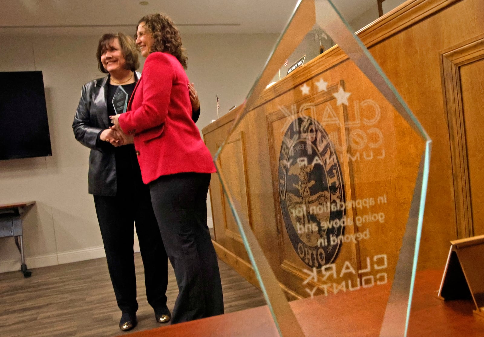 Clark County Commissioner Melanie Flax Wilt presents Bonita Heeg with one of the three Clark County Luminary Awards Wednesday, Jan. 10, 2024 during the weekly commission meeting. BILL LACKEY/STAFF