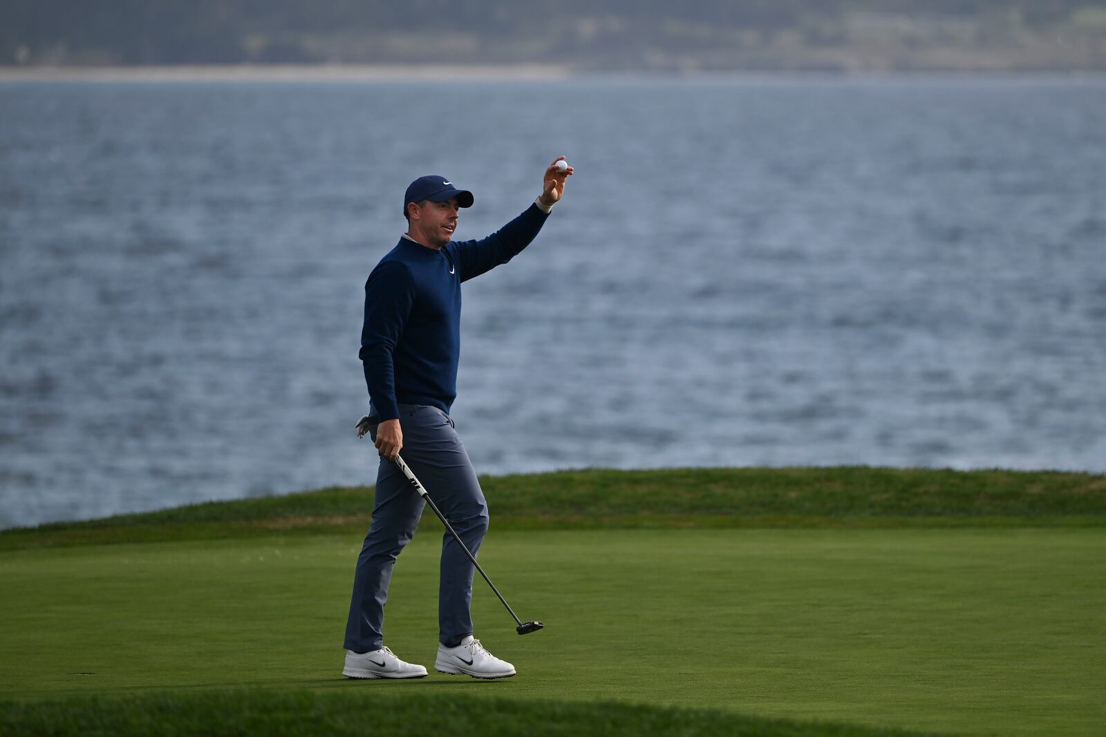 Rory McIlroy, of Northern Ireland, reacts after putting on the 18th hole at Pebble Beach Golf Links during the final round to win the AT&T Pebble Beach Pro-Am golf tournament, Sunday, Feb. 2, 2025, in Pebble Beach, Calif. (AP Photo/Nic Coury)