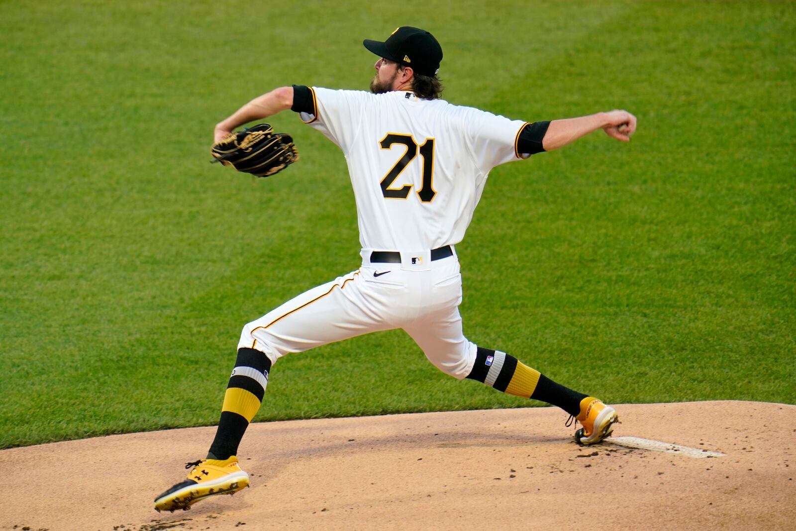 Pittsburgh Pirates starting pitcher JT Brubaker delivers during the first inning of the team's baseball game against the Chicago White Sox in Pittsburgh, Wednesday, Sept. 9, 2020. To commemorate Roberto Clemente Day, the Pirates all are wearing Clemente's No. 21. (AP Photo/Gene J. Puskar)