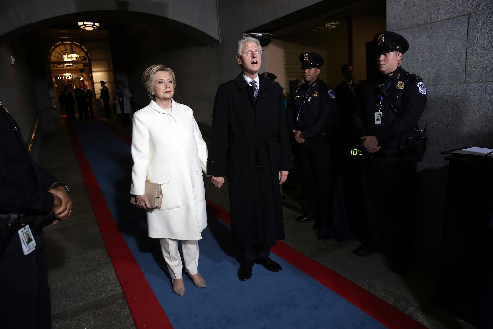 FILE - Former Sen. Hillary Clinton and former President Bill Clinton arrive on the West Front of the U.S. Capitol, in Washington, Jan. 20, 2017, for the inauguration ceremony of Donald J. Trump as the 45th president of the United States. (Win McNamee/AP Photo File)