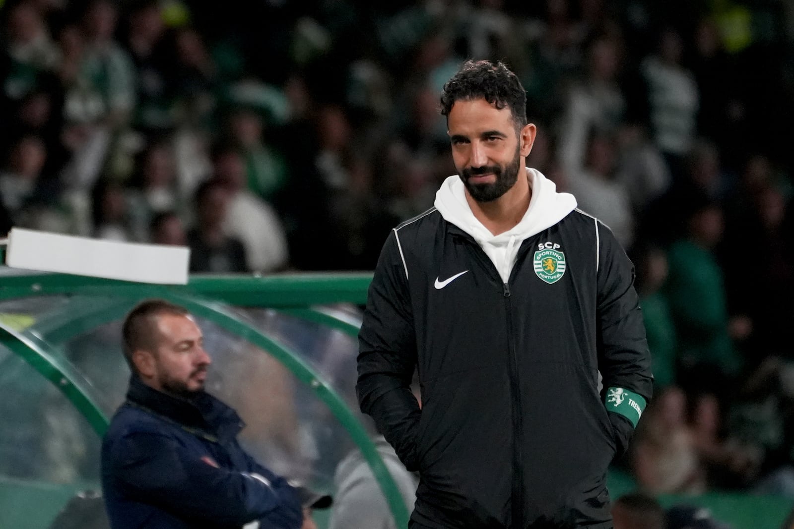 Sporting's head coach Ruben Amorim, who Manchester United has expressed an interest in hiring, stands by the touchline during a Portuguese League Cup soccer match between Sporting CP and Nacional at the Alvalade stadium in Lisbon, Tuesday, Oct. 29, 2024. (AP Photo/Ana Brigida)