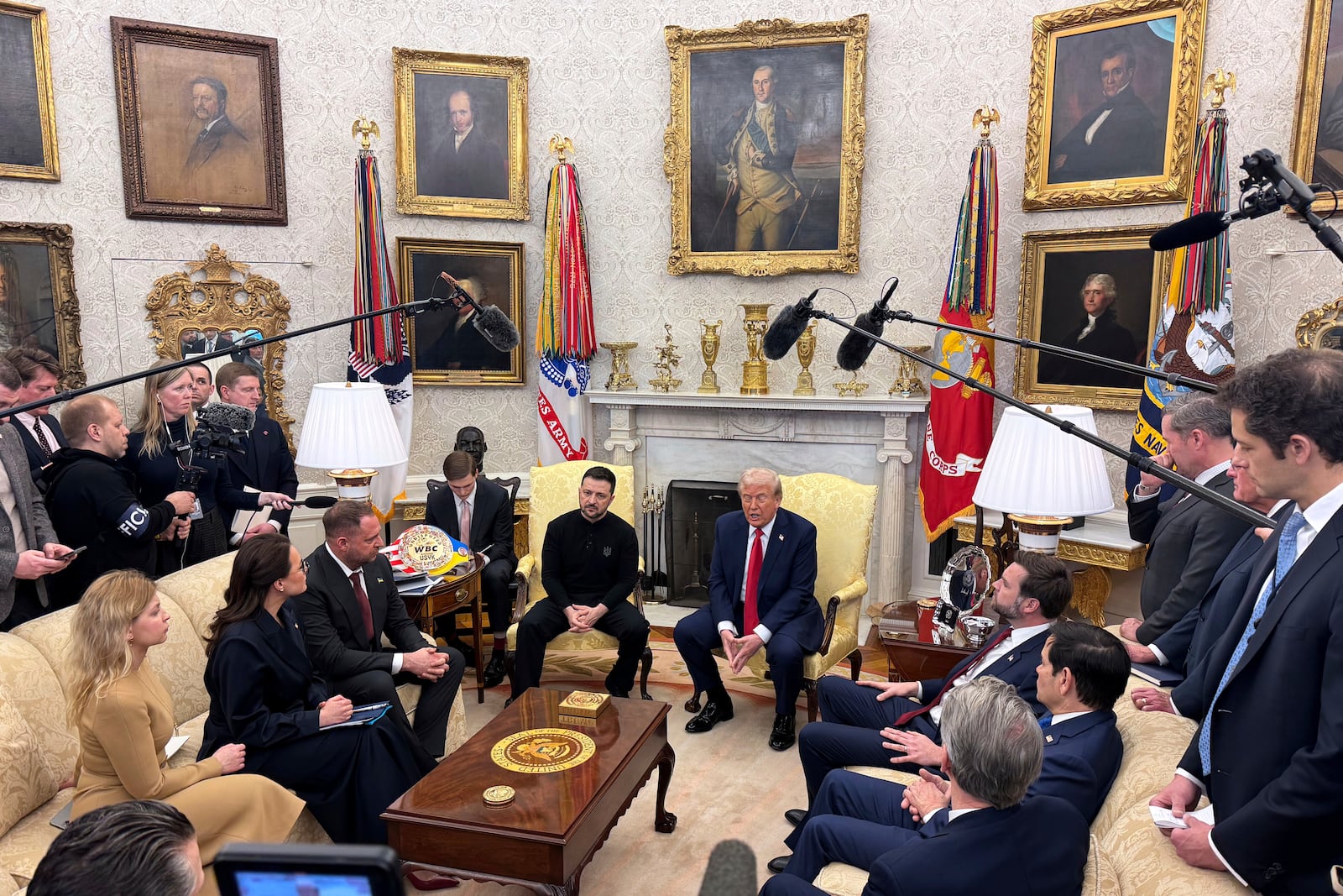 President Donald Trump, center right, meets with Ukrainian President Volodymyr Zelenskyy, in the Oval Office at the White House, Friday, Feb. 28, 2025, in Washington. (AP Photo/ Mystyslav Chernov)