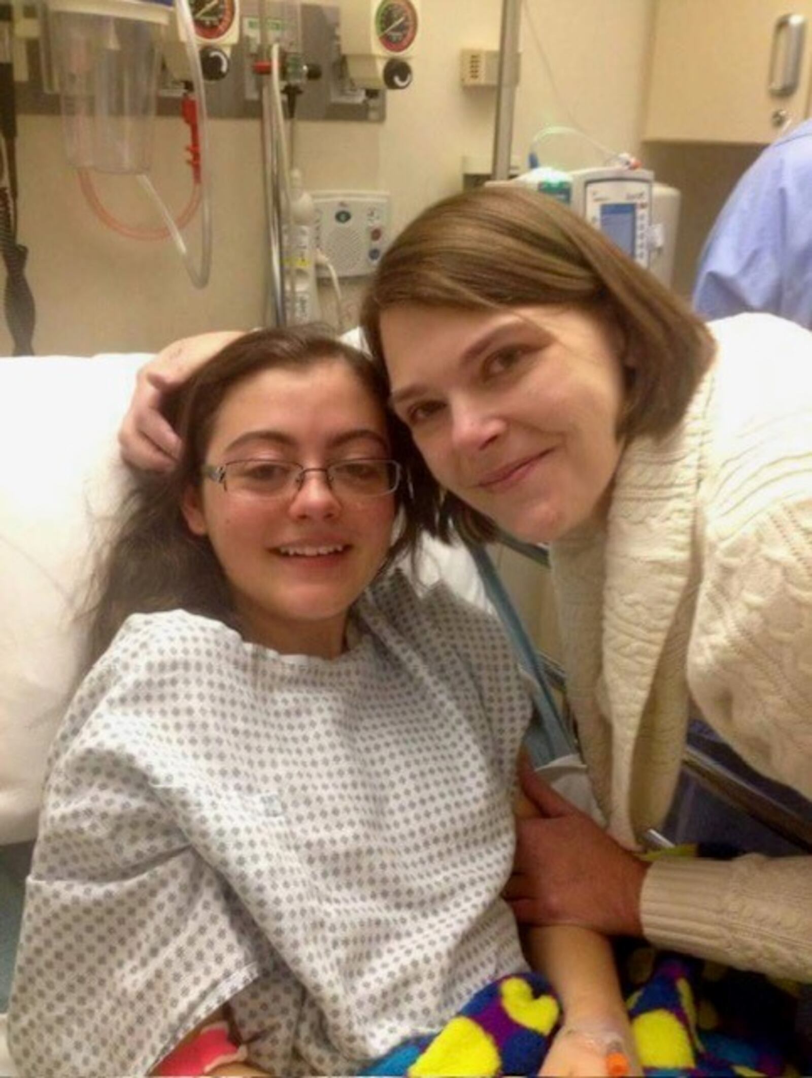 Alaina Tuttle (left) and Amanda Donnelly reunited following a spinal fusion surgery when Tuttle was 14. Donnelly was Tuttle's nurse after pediatric surgeries to treat cancer, and she bonded with the family. CONTRIBUTED PHOTO