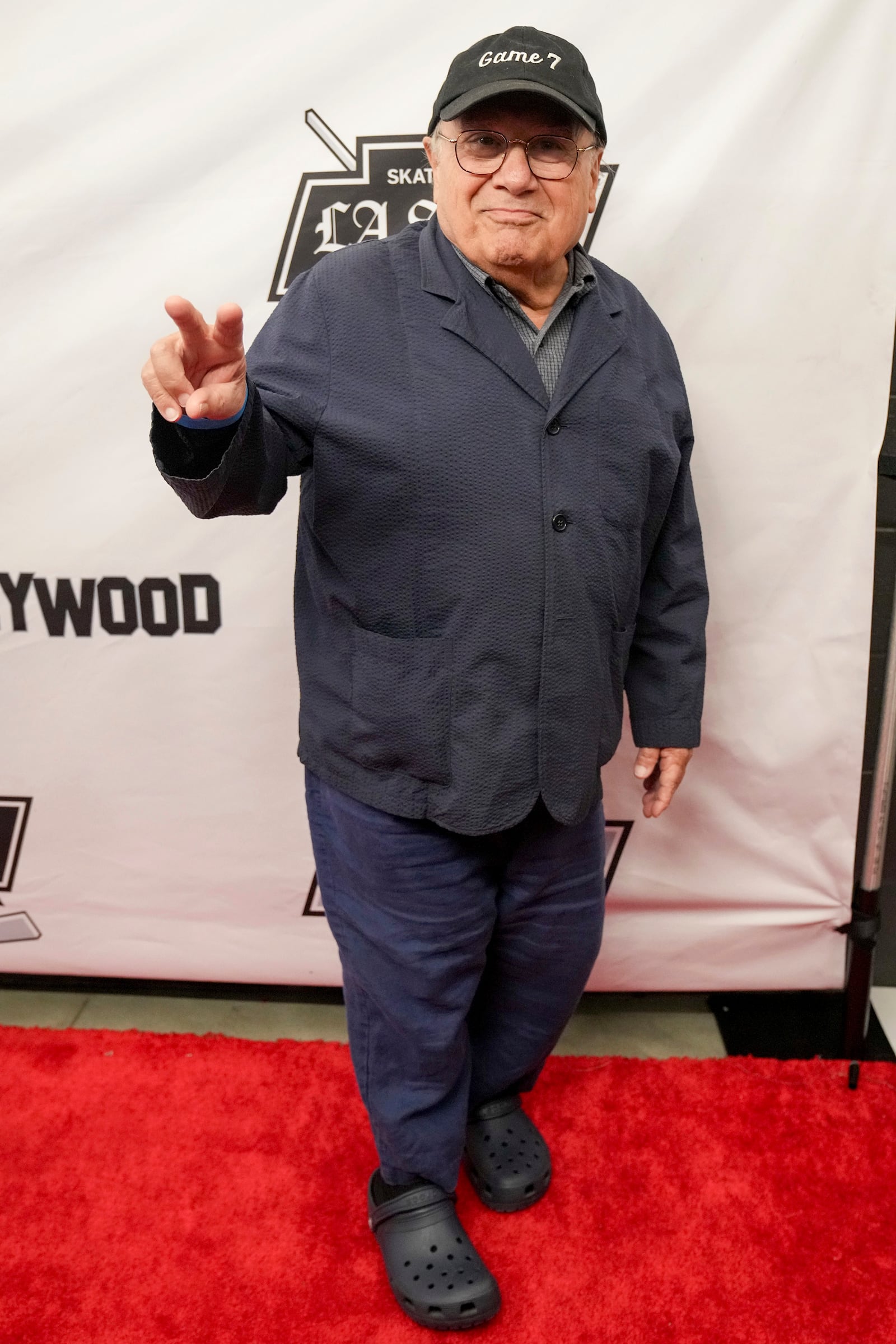 Team Blue coach actor Danny DeVito arrives during the Skate for LA Strong celebrity hockey game, Sunday, Feb. 23, 2025, in Los Angeles. (AP Photo/Eric Thayer)