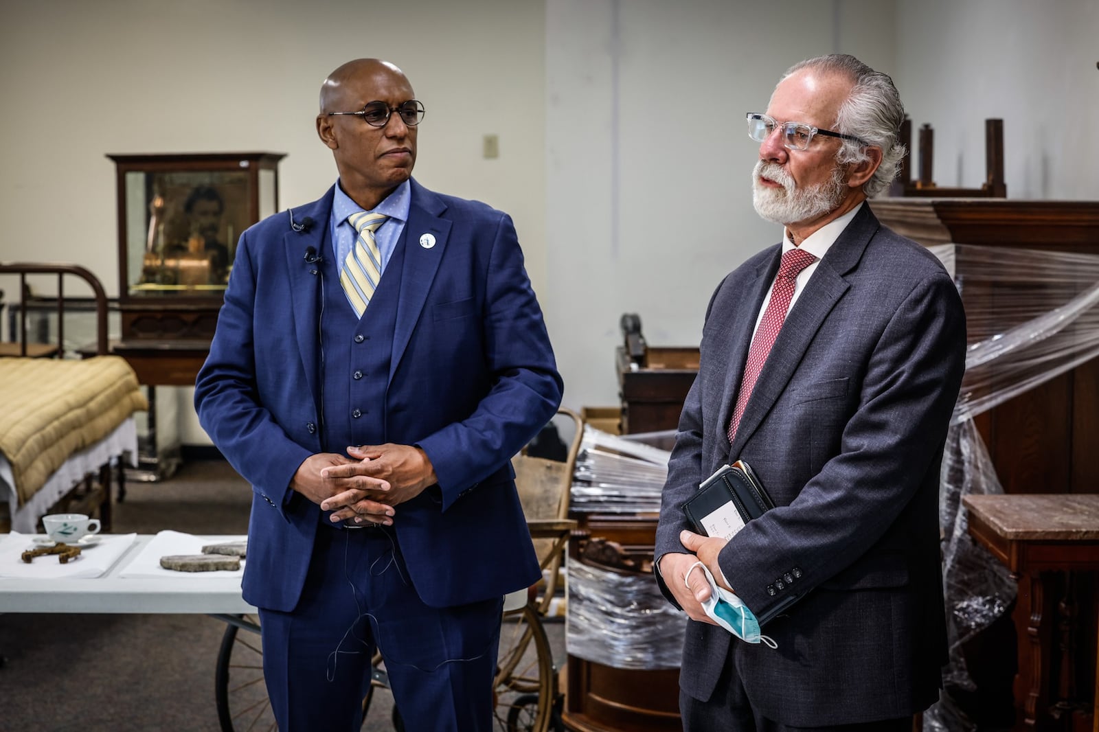 Deputy Secretary of Veterans Affairs Donald Remy, left and Director of  Dayton VA Health Care, Mark Murdock, talked to the media last year about plans for an estimated $100 million National VA History Center on the Dayton Campus. JIM NOELKER/STAFF