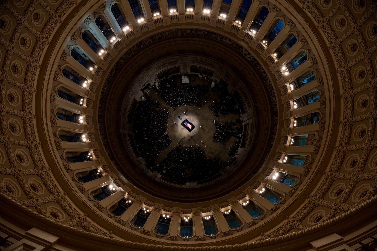 The flag-draped casket of former President Jimmy Carter lies in state at the rotunda of the U.S. Capitol Tuesday, Jan. 7, 2025, in Washington. (Andrew Harnik/Pool via AP)