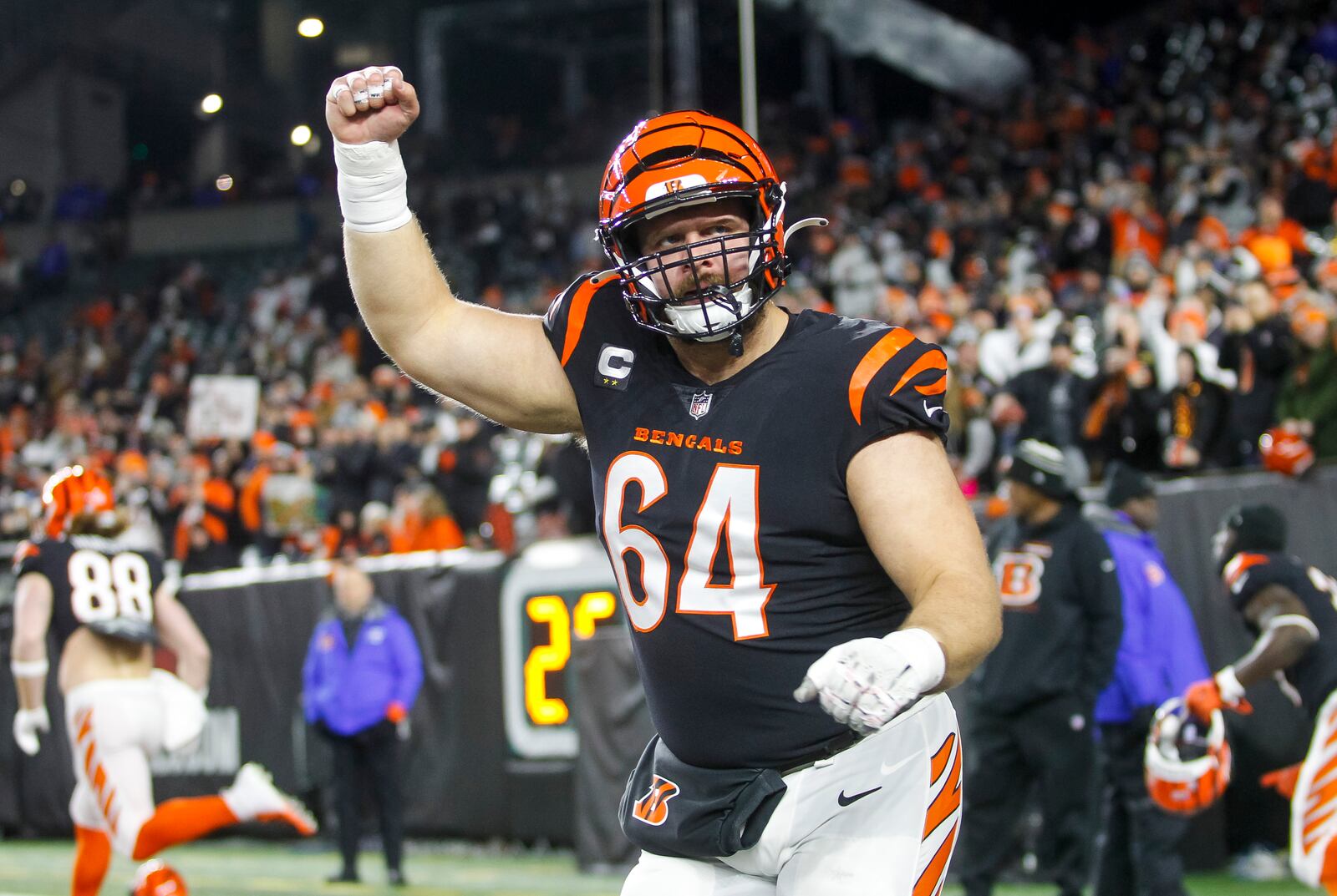 Bengals center Ted Karras runs onto the field before the Cincinnati Bengals defeated the Baltimore Ravens 24-17 in their Wild Card playoff game Sunday, Jan. 15, 2023 at Paycor Stadium in Cincinnati. NICK GRAHAM/STAFF