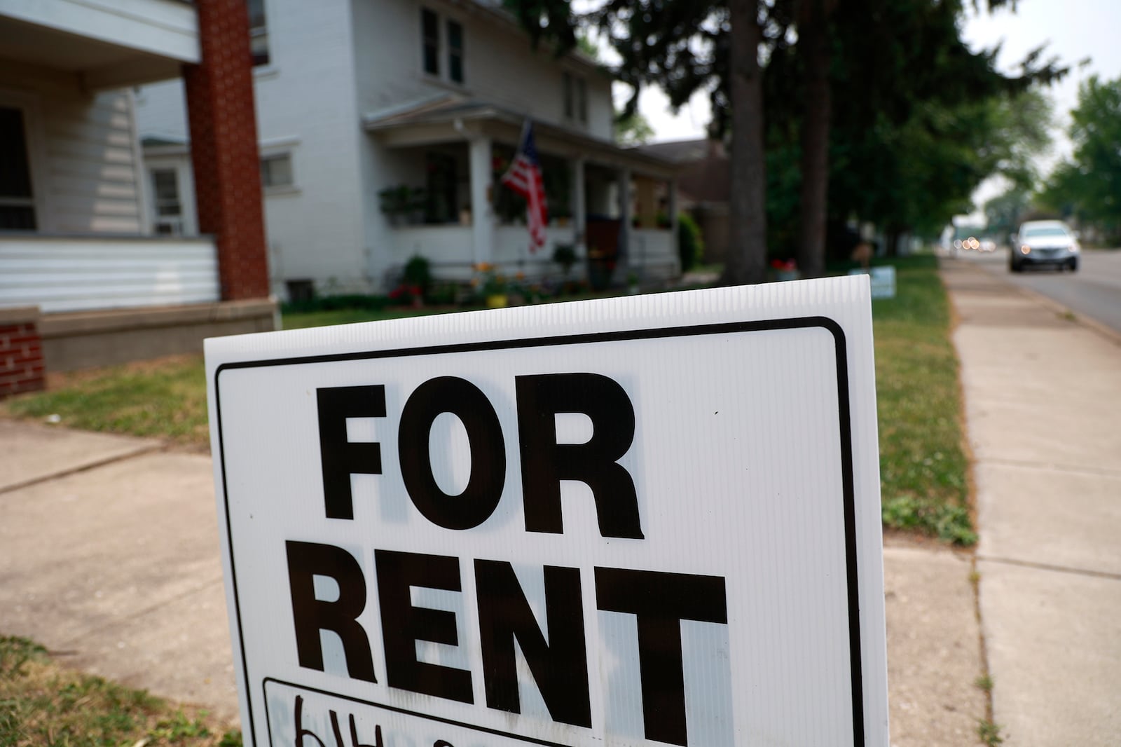 A "For Rent" sign in front of a house along North Limestone Street Monday, June 5, 2023. BILL LACKEY/STAFF